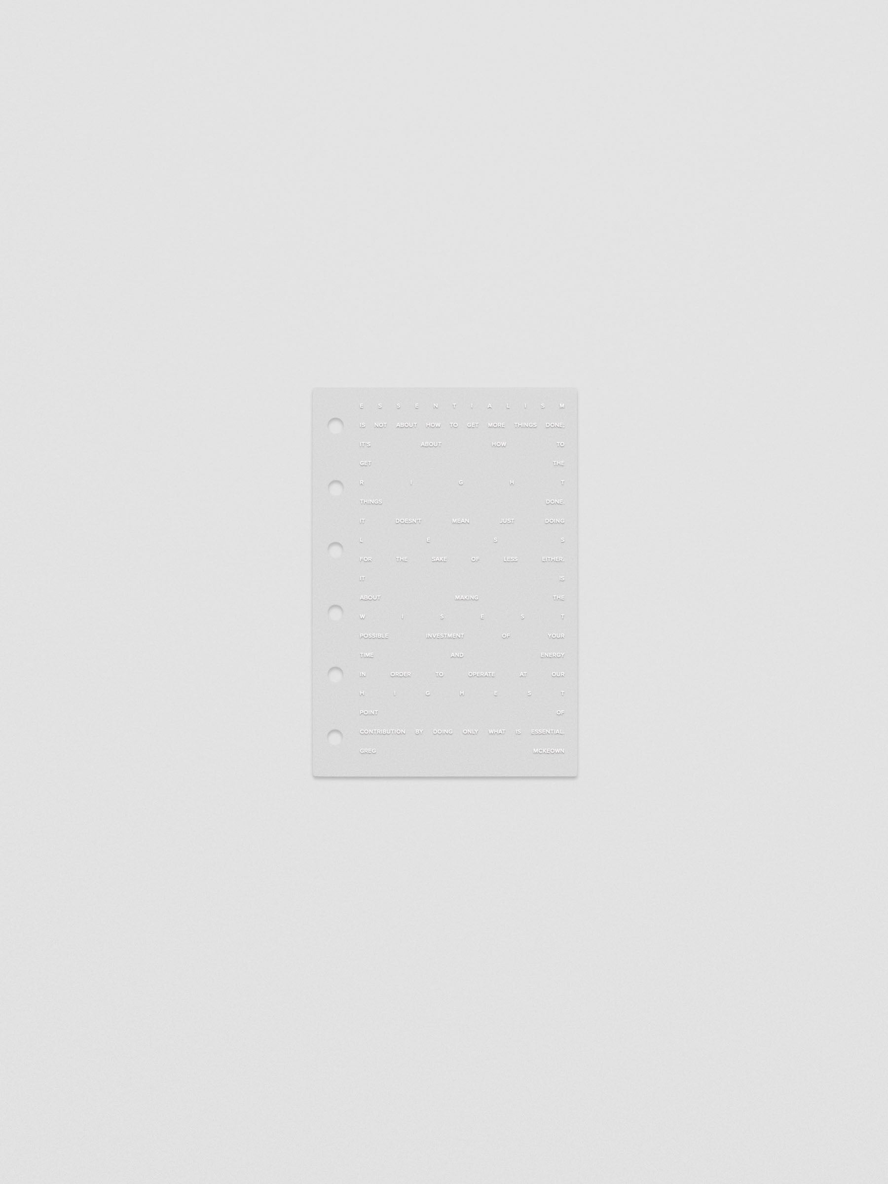 Essentialism Dashboard Duo reading "moins mai mieux" in size Pocket; transparent layer only.