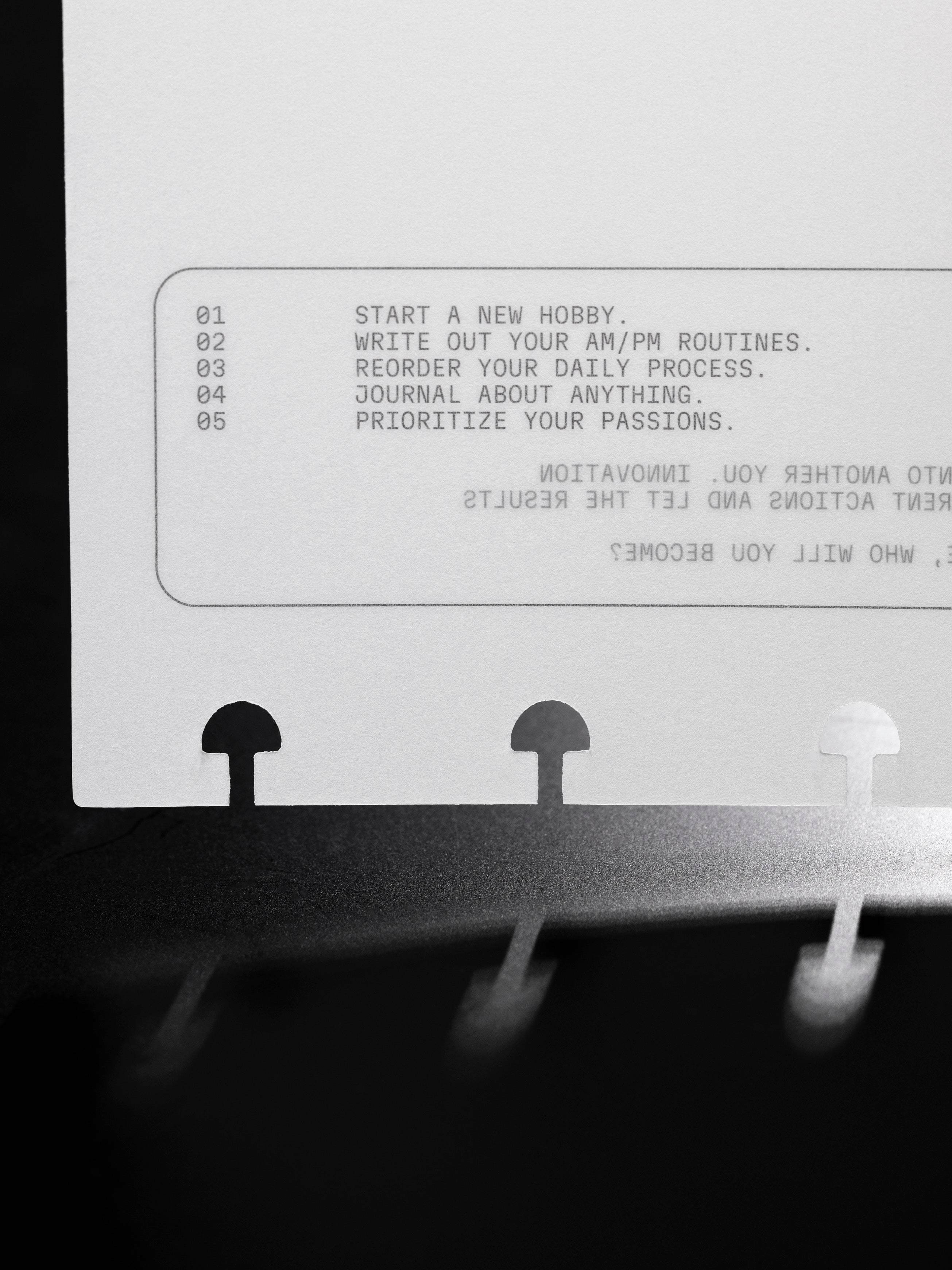 Detail view of text on Side A & Side B Planner dashboard on the themes of starting new things, journaling, and routines.