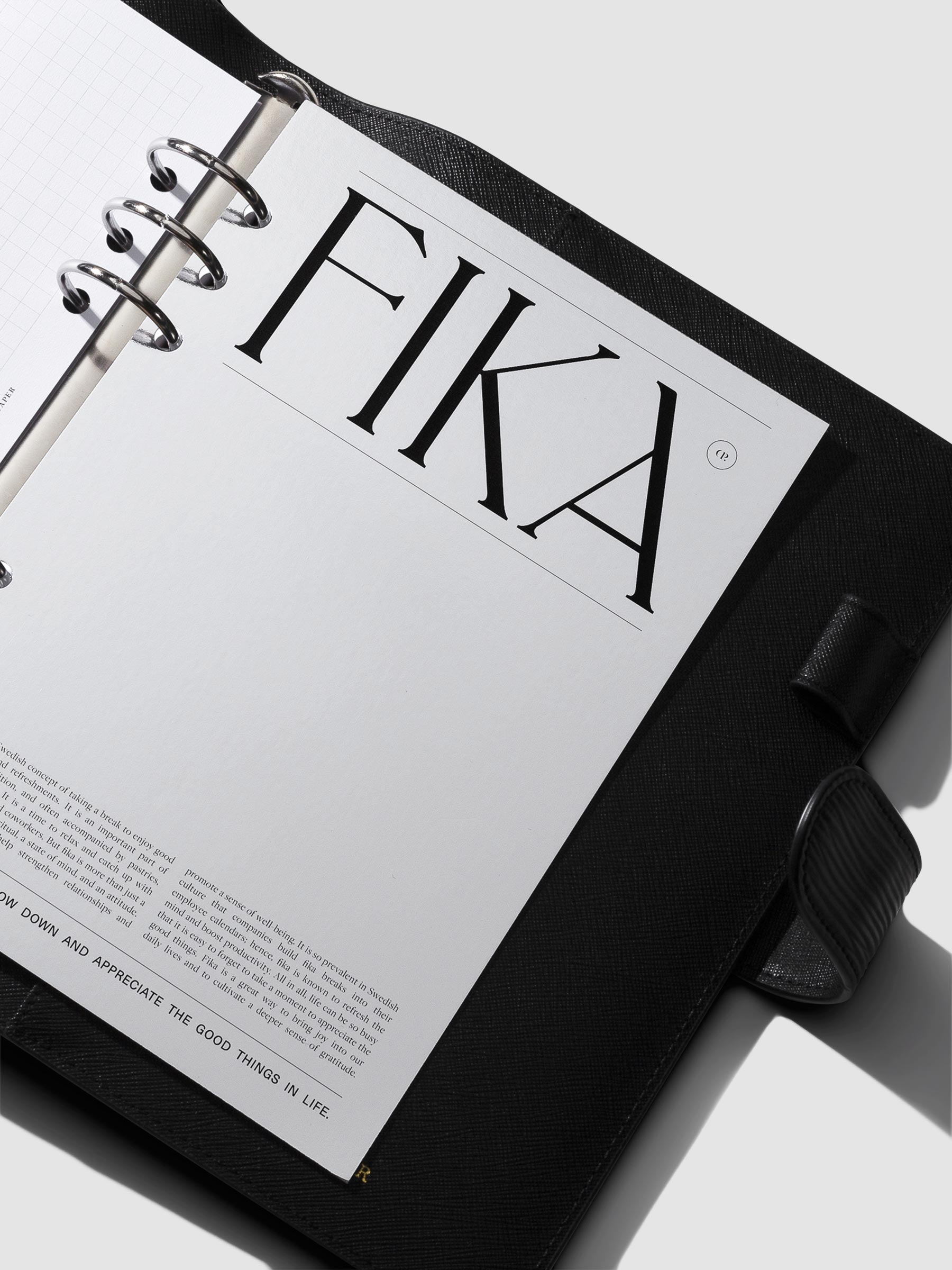 Dashboard in use inside a black leather agenda.