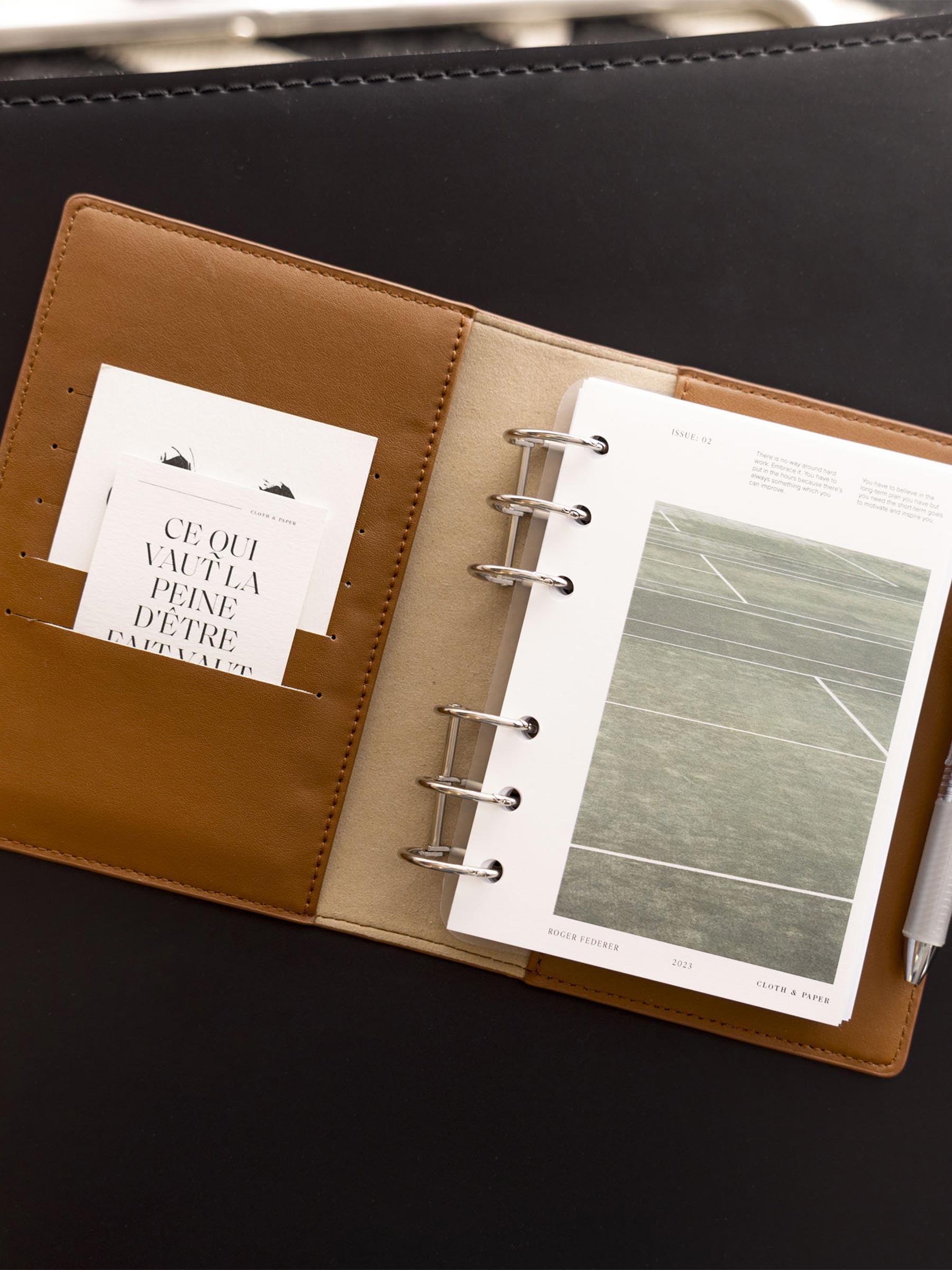 CP Petite/A6 cover displayed inside a brown leather folio with silver rings. Size shown is A6.