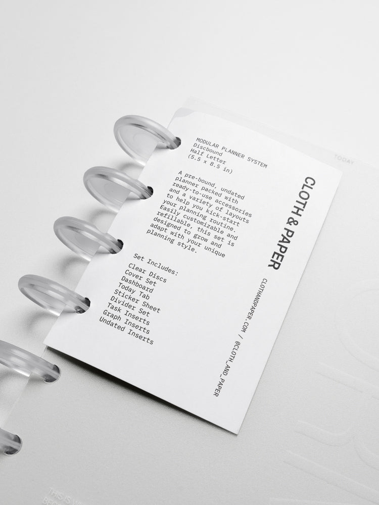 Closed Forma Modular Planner System in Half Letter (top) and open in CP Petite (bottom) against a dark background.