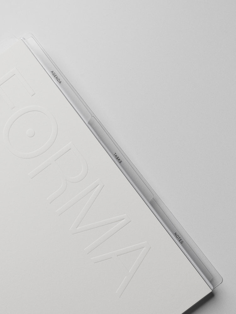 Close up view of the packaging label of the Forma Modular Planner System in Half Letter with details of what's included in the system.