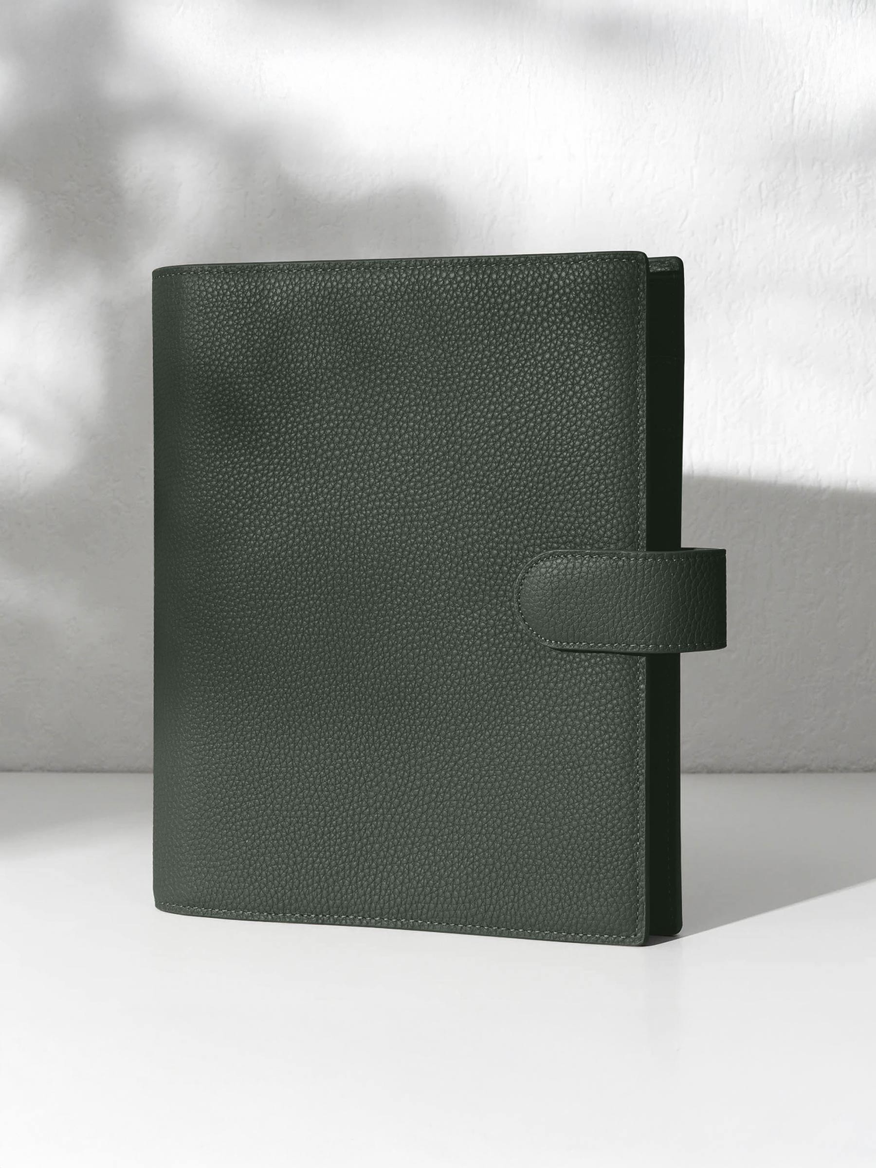Cypress leather agenda displayed against a shadowed background.