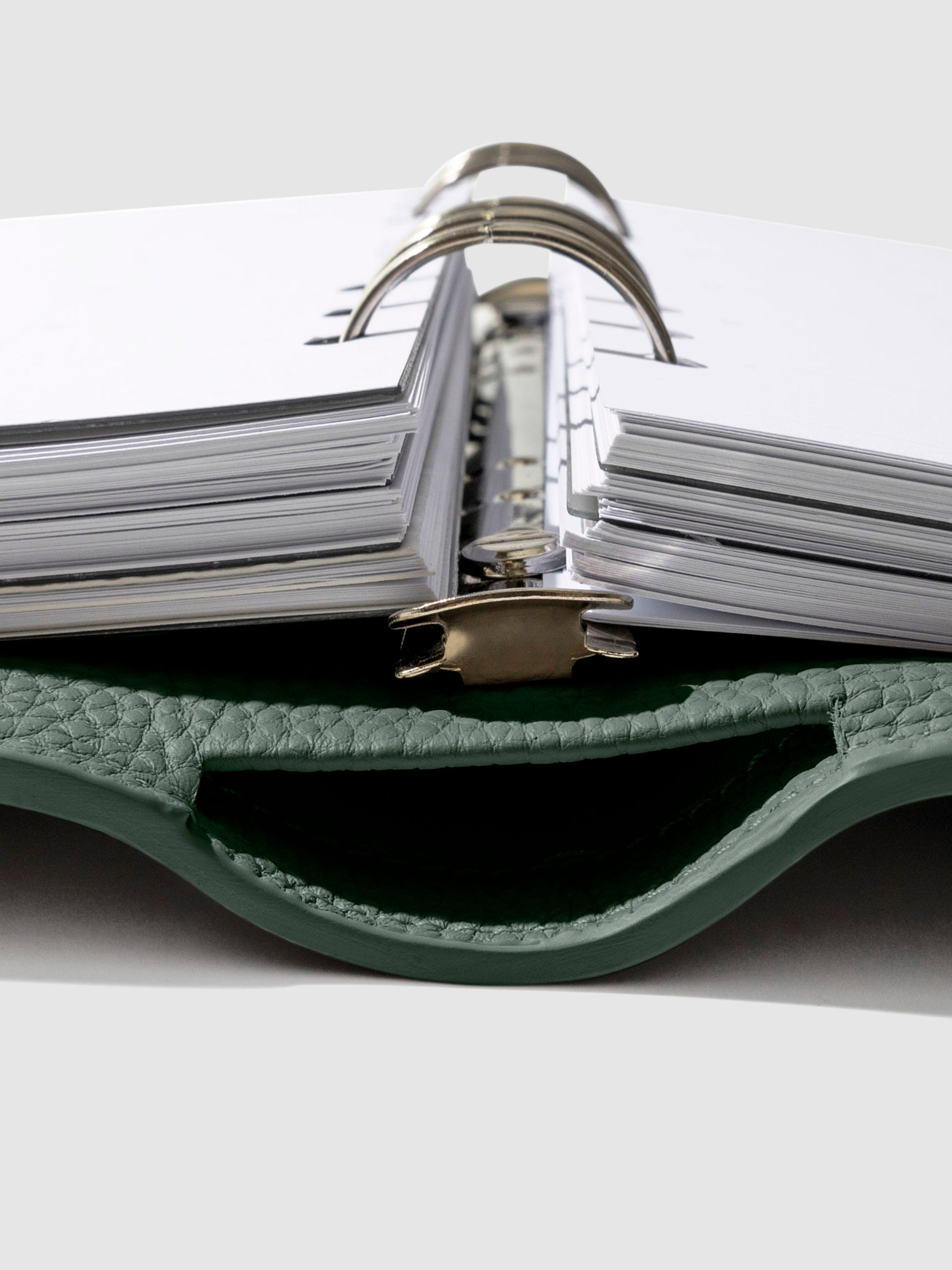 Close-up of silver hardware in a Cypress leather agenda.