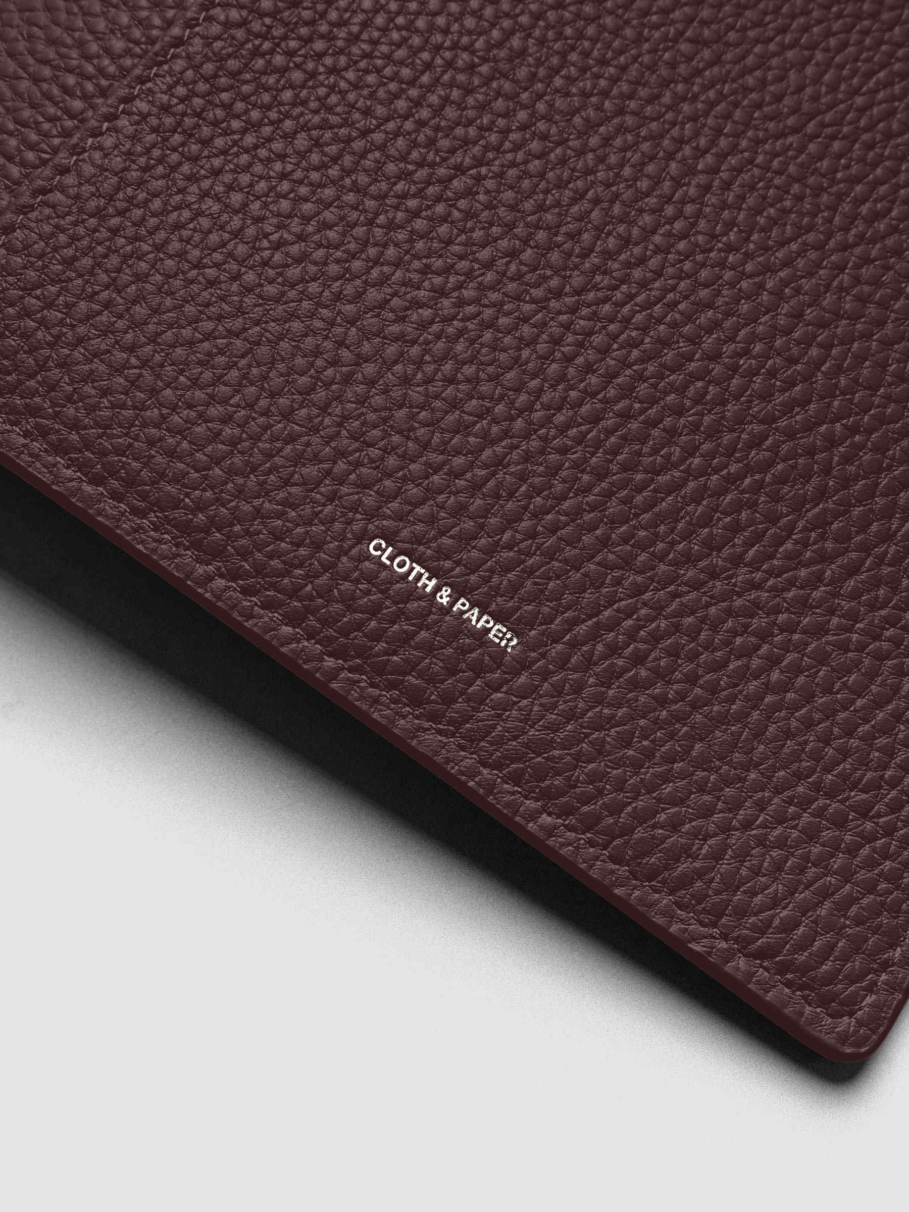 Close up of the Leather Agenda with silver Cloth & Paper logo embossing.