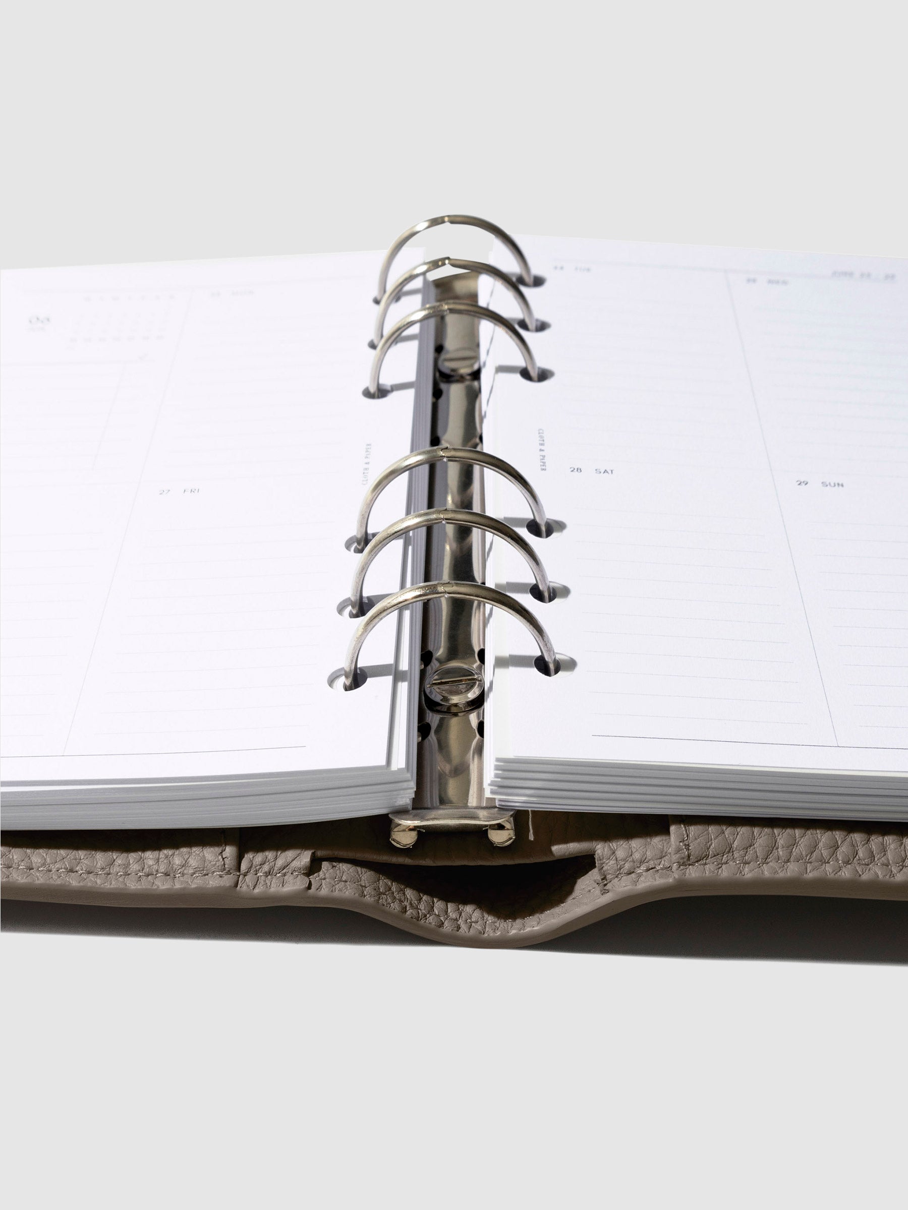 Close-up of the cortado leather agenda ring mechanism.