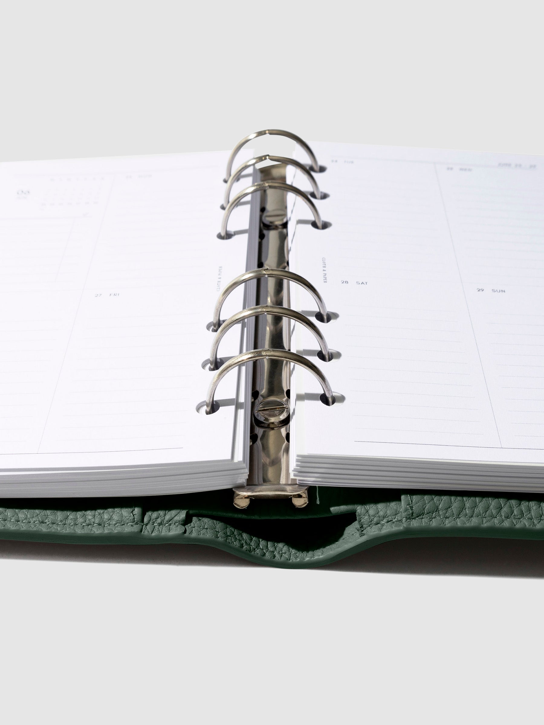 Close-up of the cypress leather agenda ring mechanism.