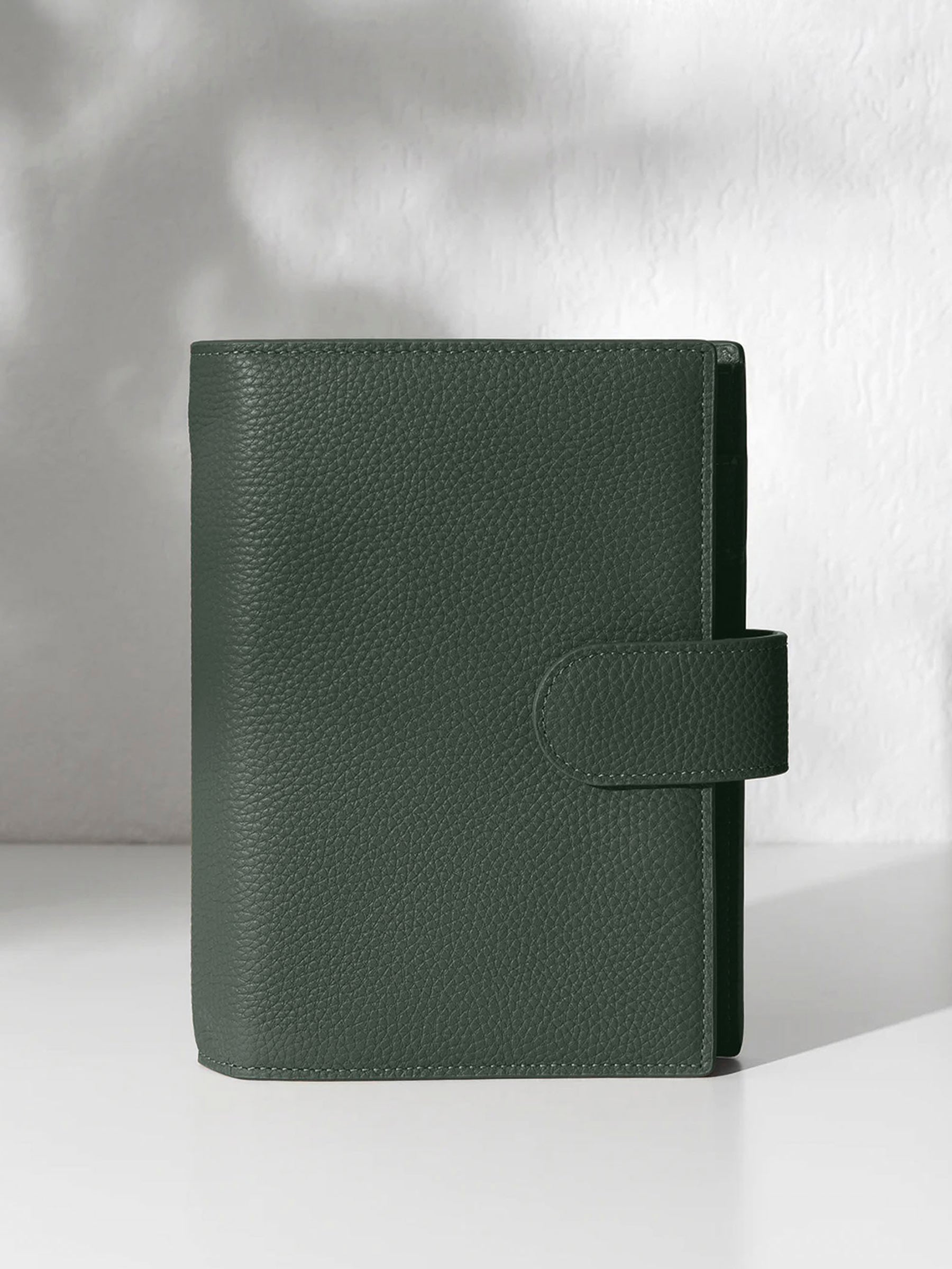 Cypress leather agenda displayed against a shadowed background.