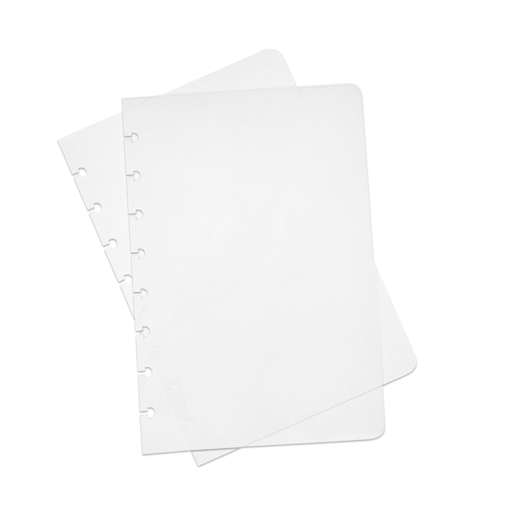 Glass Plastic Discbound Notebook Cover, Half Letter, Cloth and Paper. Two transparent notebook covers laid on top of one another with the bottom cover tilted slightly to the right.