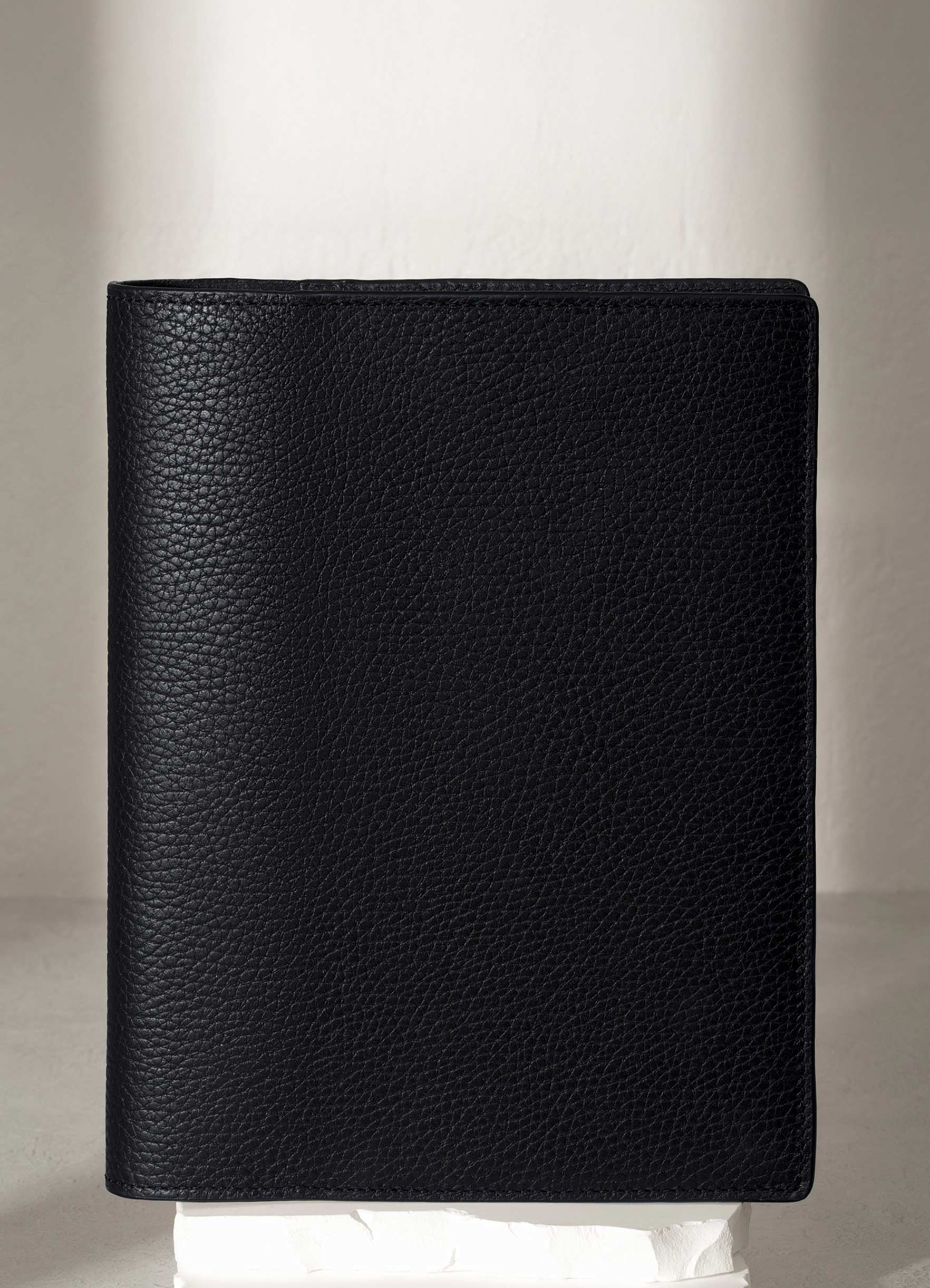 Padrillo  folio displayed on a white pedestal.