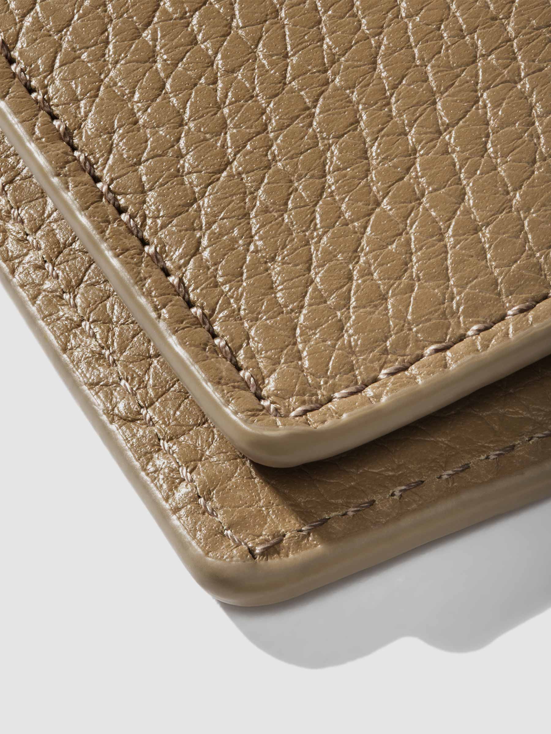 Closeup of Catalonia folio showing the stitching and glazing.