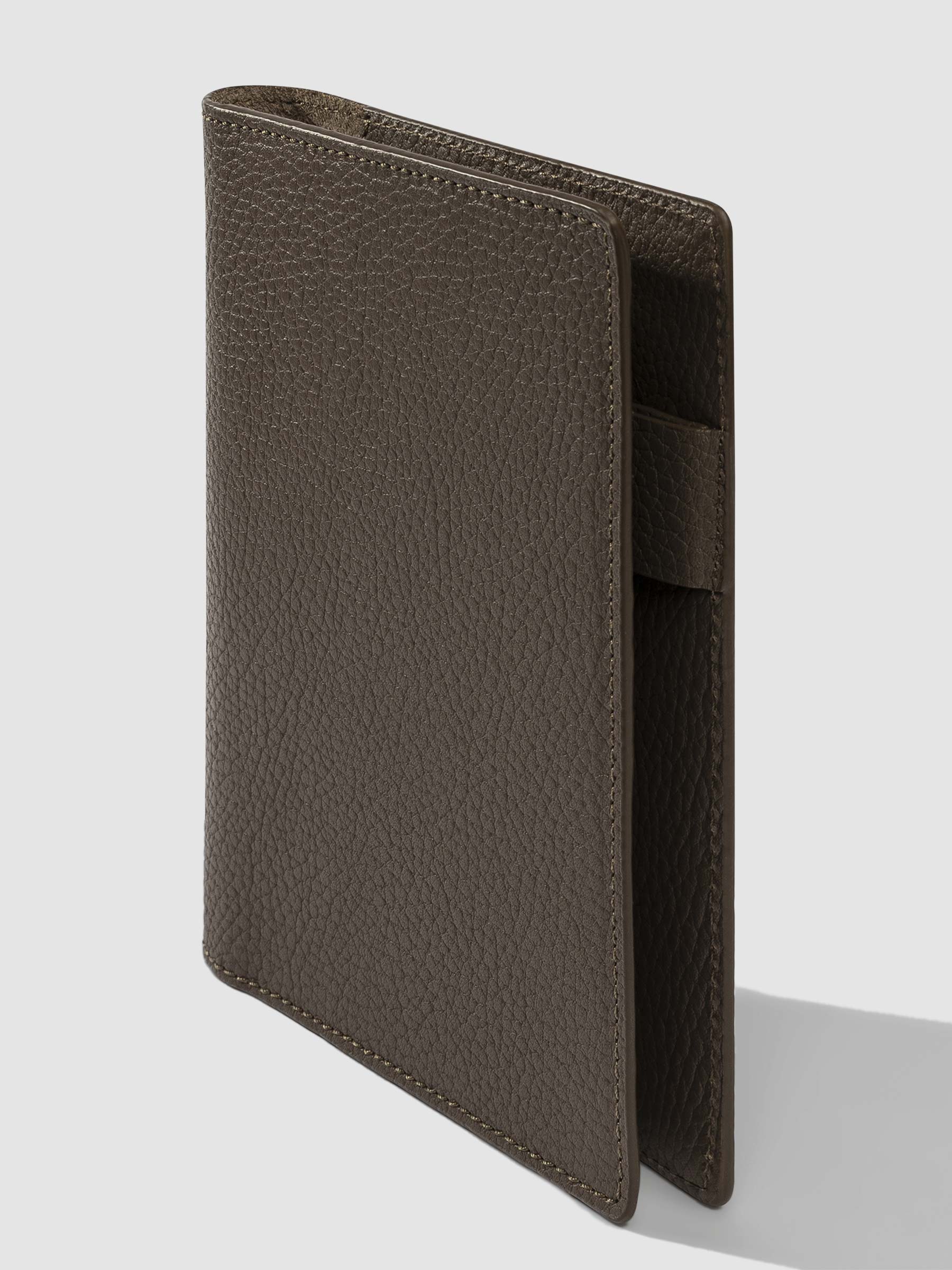 3/4 view of Leon folio on a neutral background.