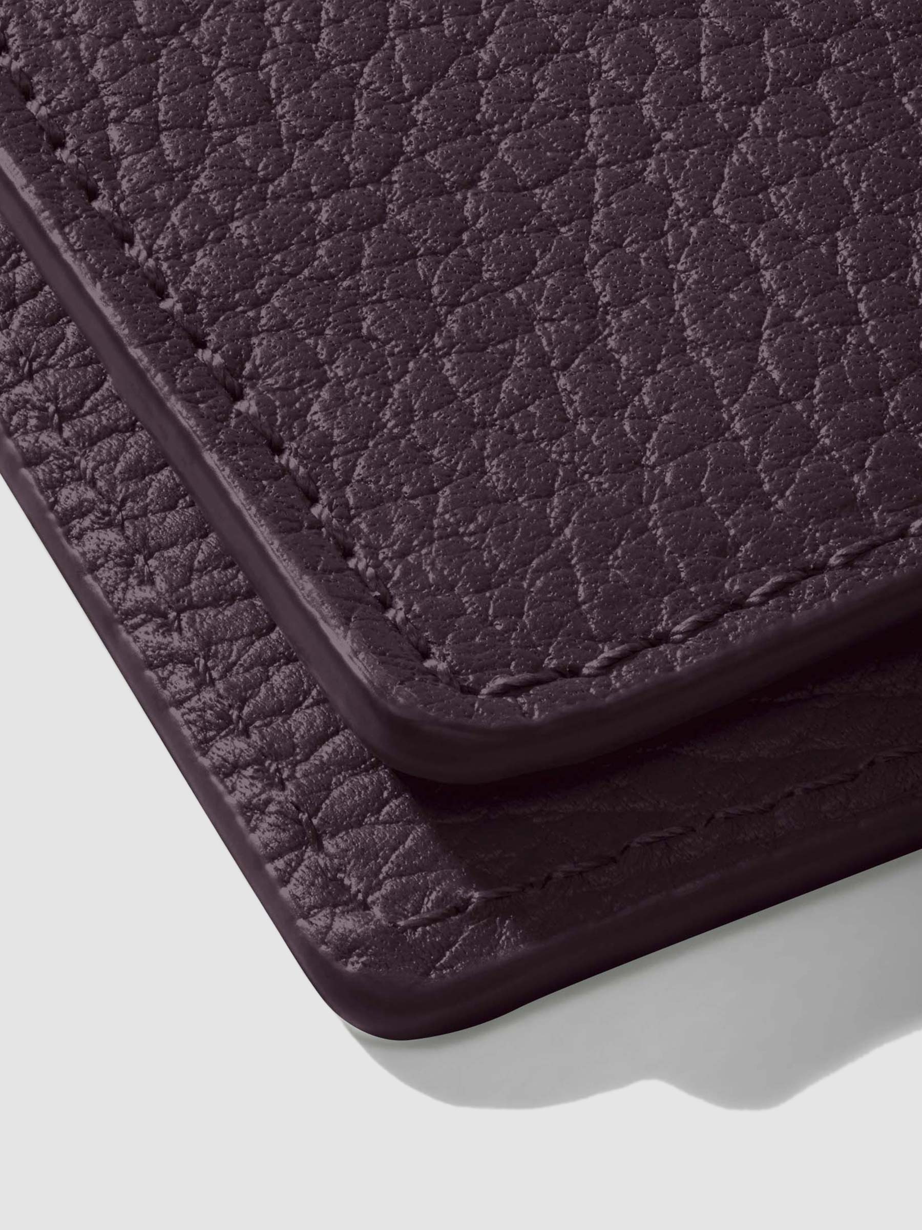 Closeup of glazing on leather folio.