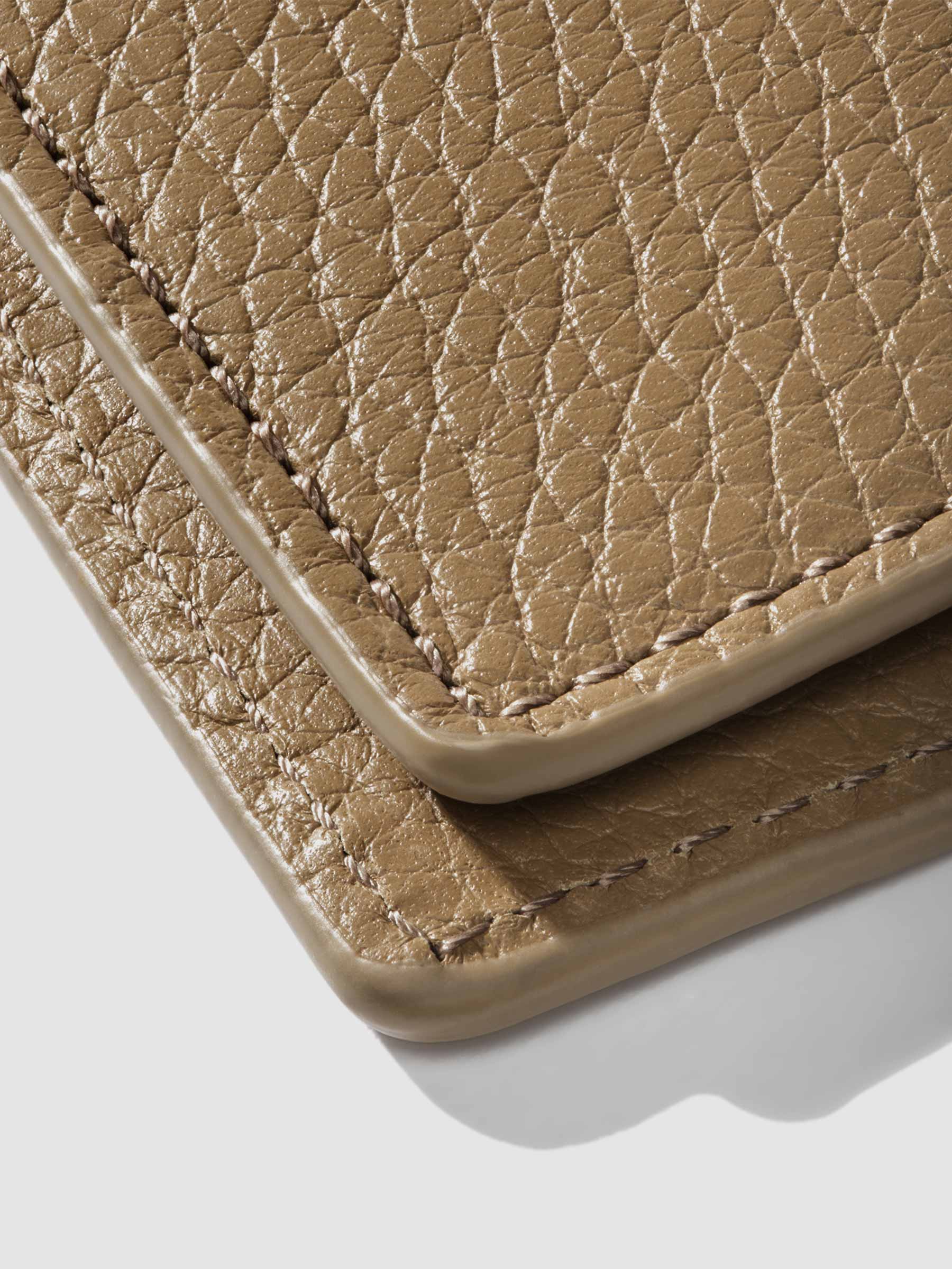 Closeup of Catalonia folio showing the stitching and glazing.