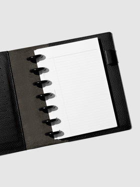 HP Mini discbound planner in a black leather folio with black discs and task planner inserts.