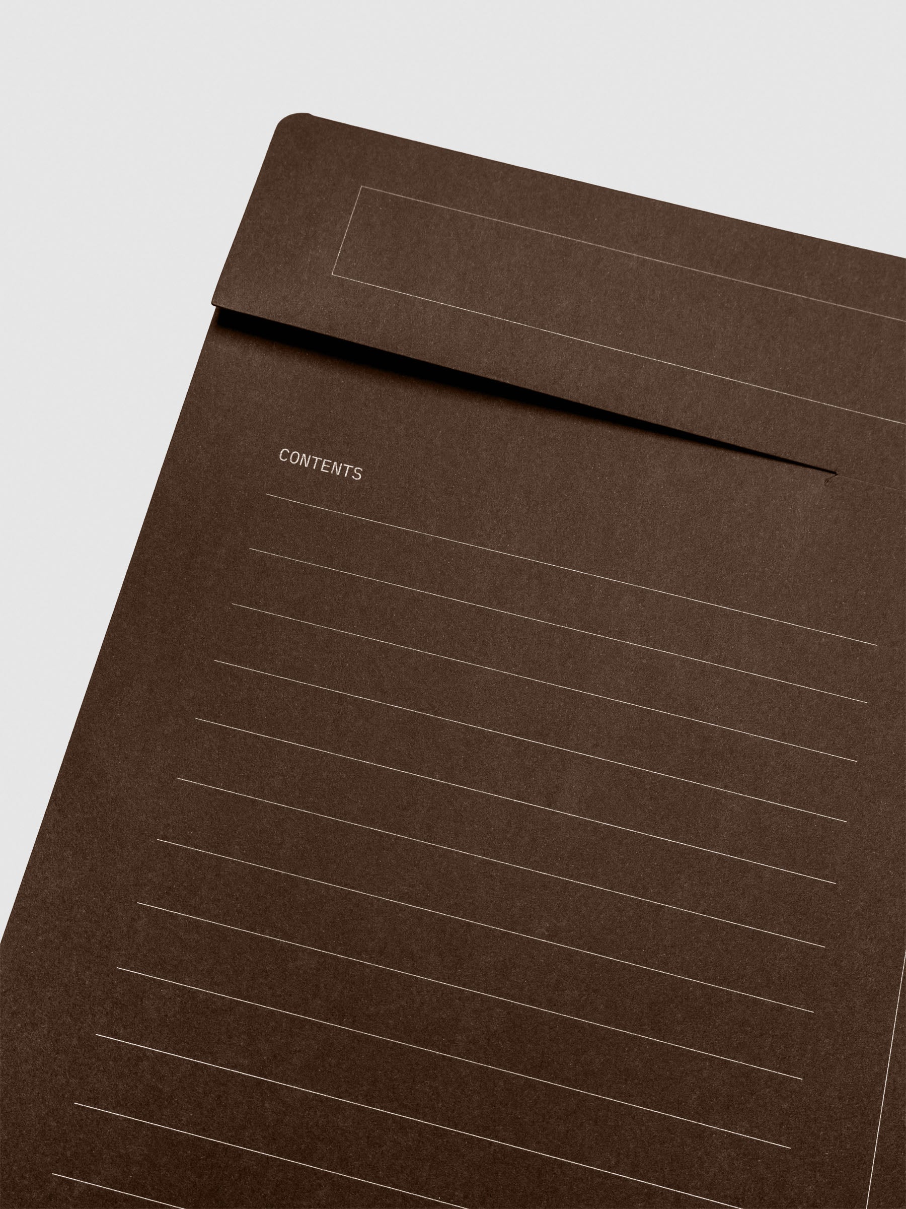 Close-up of the lined 'Contents' section on the front of the espresso index folder, for listing enclosed items.