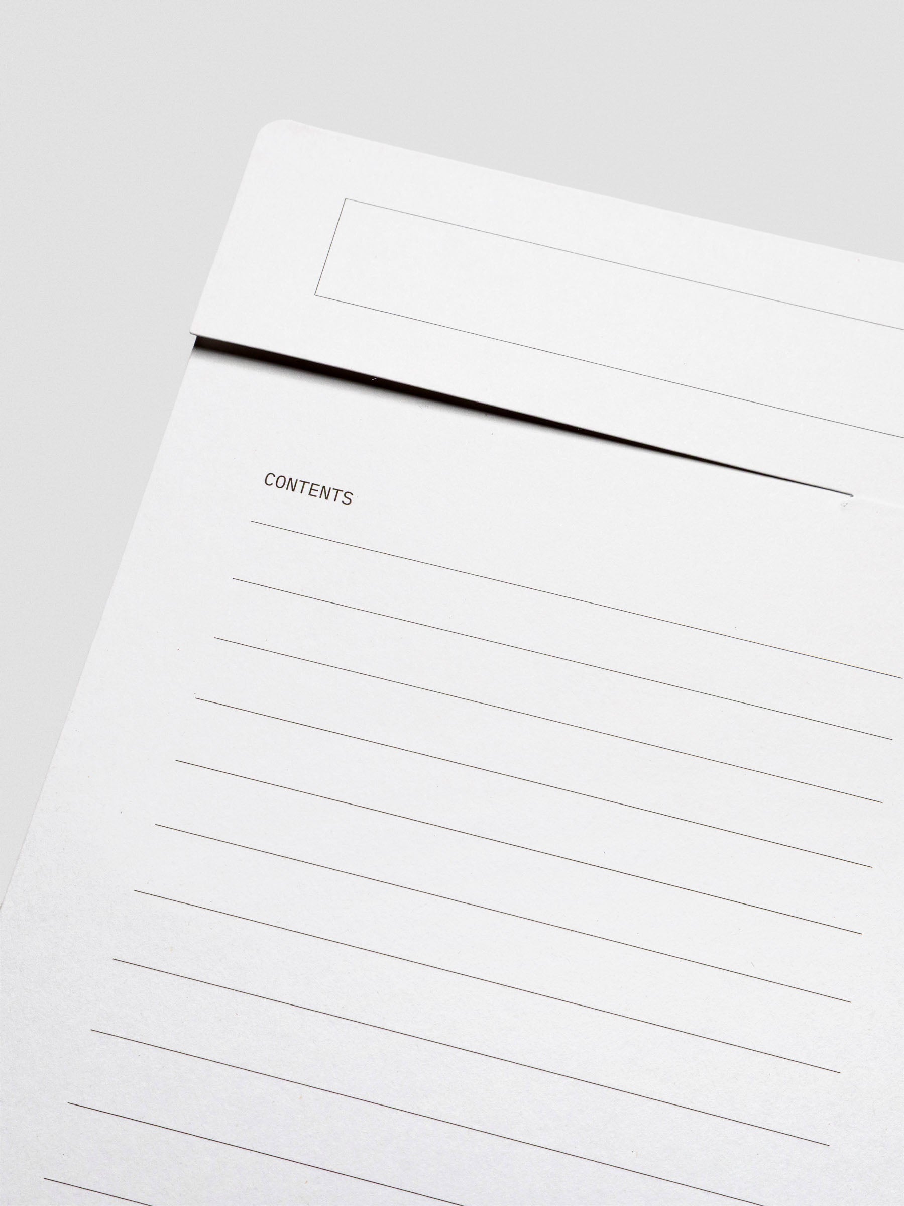 Angle view of the white Index Folder showing the lined “Contents” section with space for itemized notes or documentation.