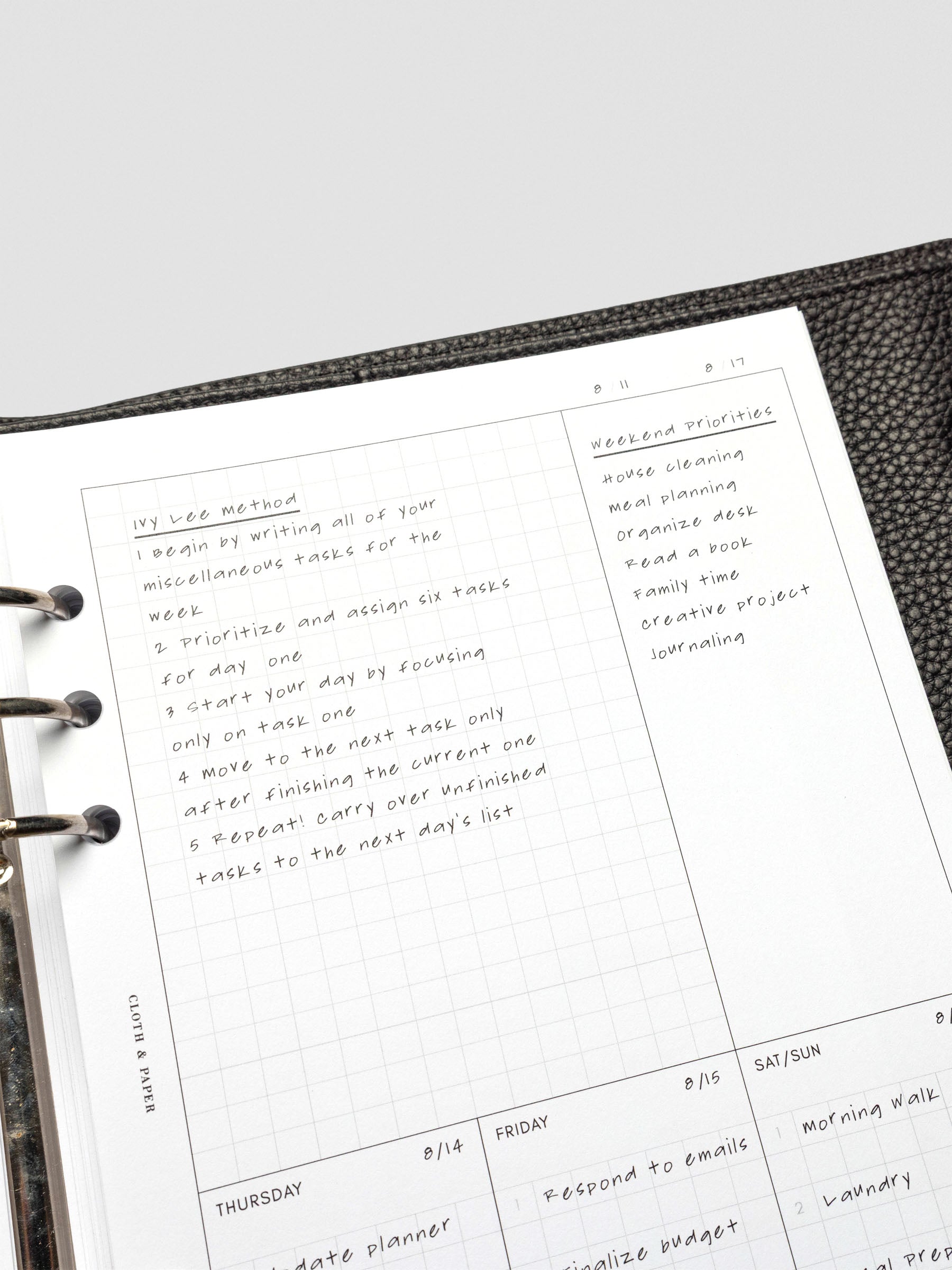 Filled-out Ivy Lee Priority Planner Insert showing a sample week, with handwritten notes in the "Task Dump" and “Weekend Priorities” sections, as well as daily tasks assigned for Thursday through Sunday.