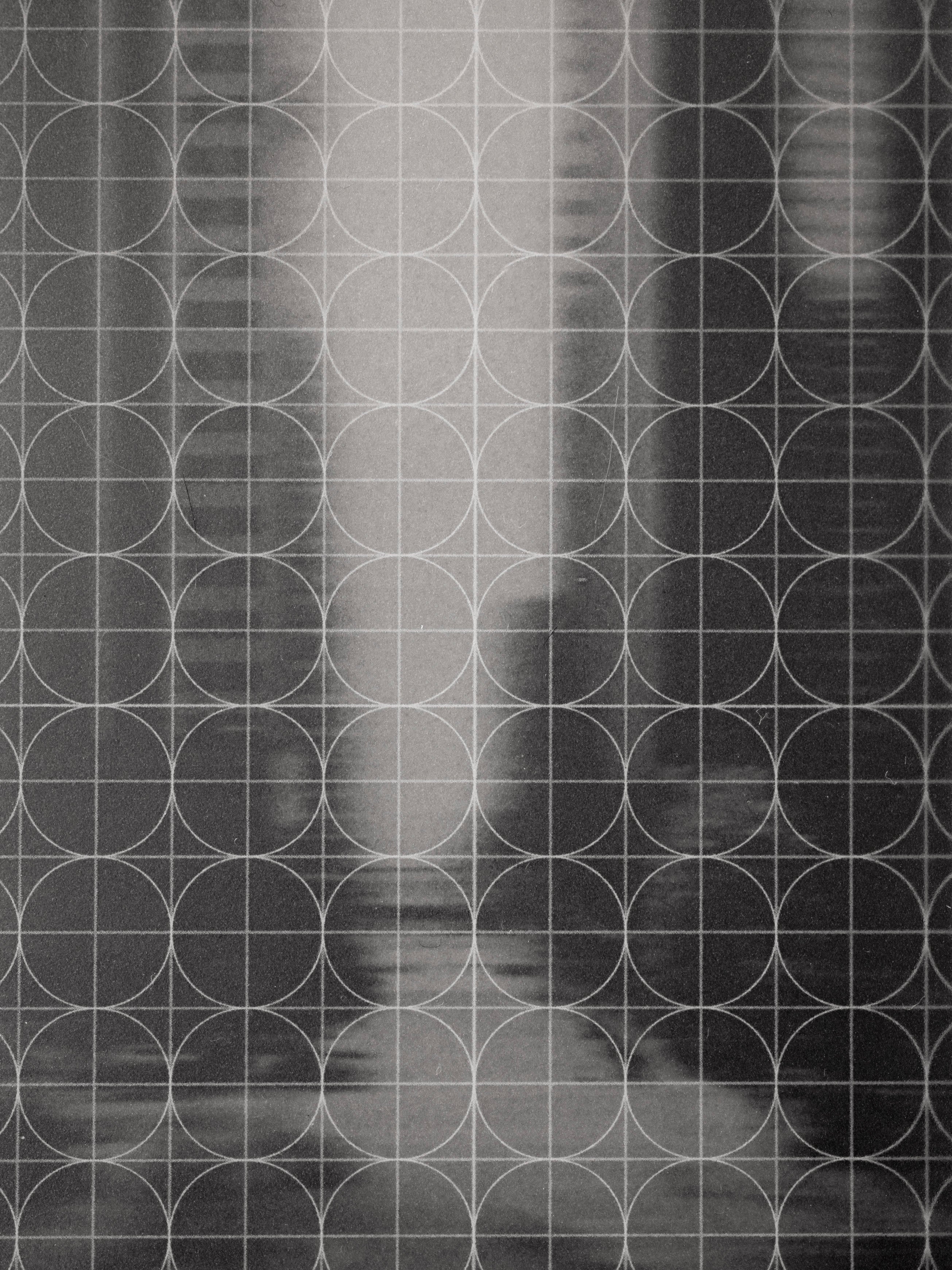 Close up view of inner transparent decorative graph and photograph layers.