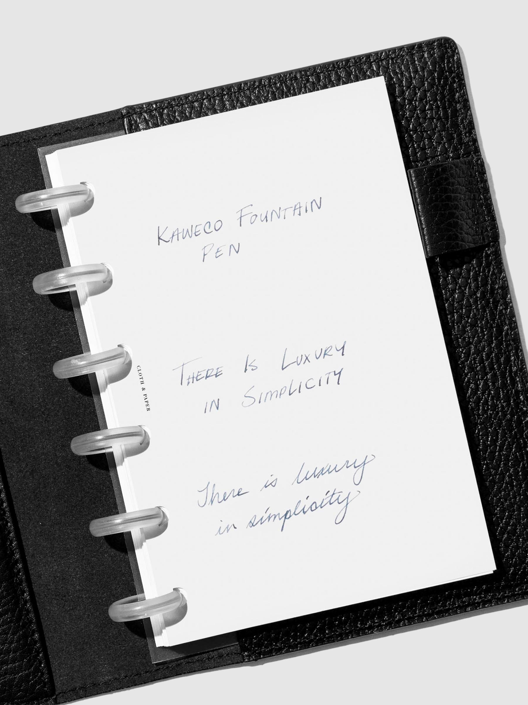 Pen testing sheet showing an extra fine nib writing sample.