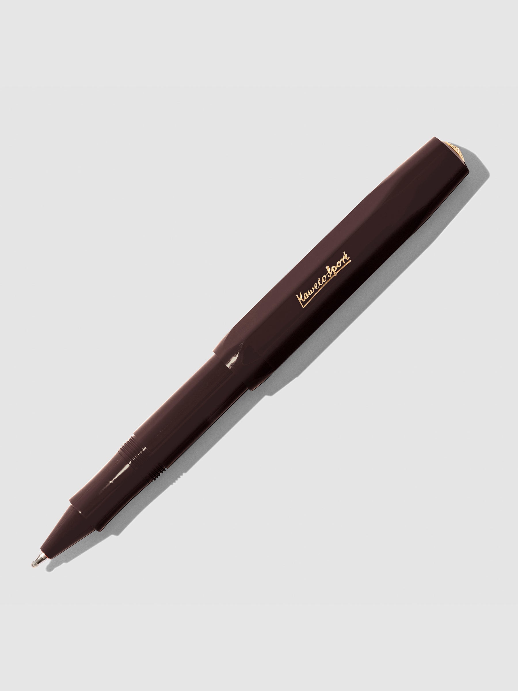 Burgundy Rollerball pen displayed on a neutral background.