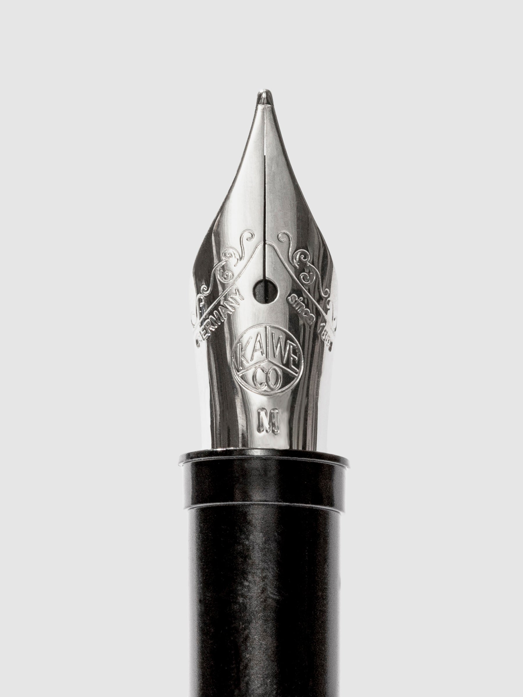 Kaweco Fountain Pen Replacement Nib, Medium, Cloth and Paper. Close up image of pen nib on a white background.