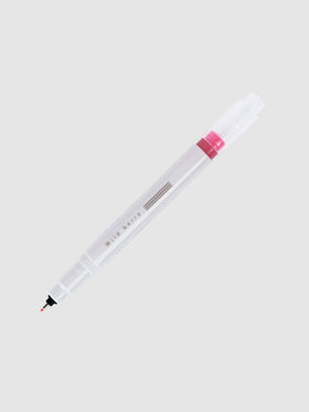 Fineliner marker in Wild Berry with nib exposed and cap posted to the end of its barrel on a neutral background.