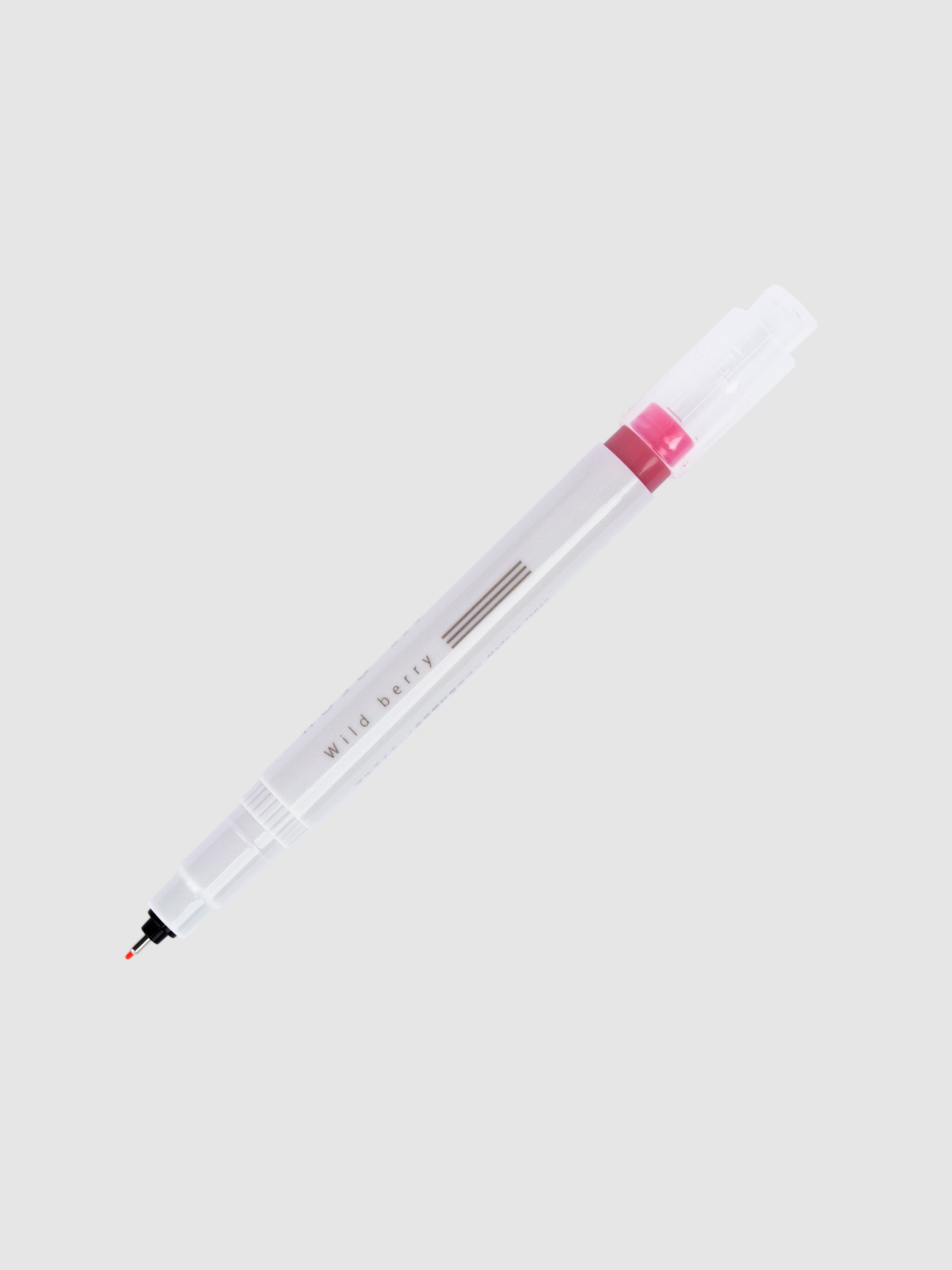 Fineliner marker in Wild Berry with nib exposed and cap posted to the end of its barrel on a neutral background.