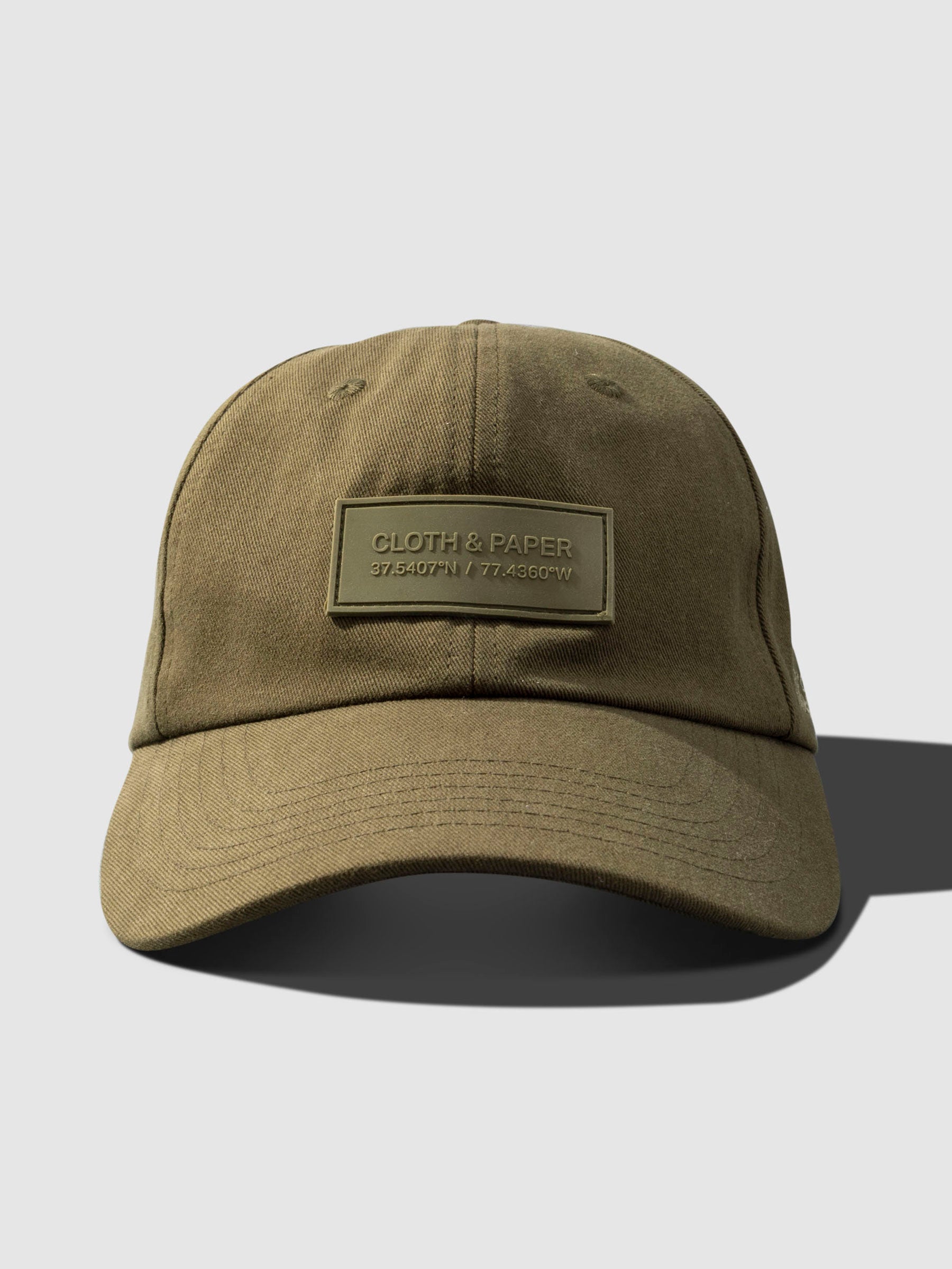 Label Hat, Cloth and Paper. Hat displayed on a neutral background.