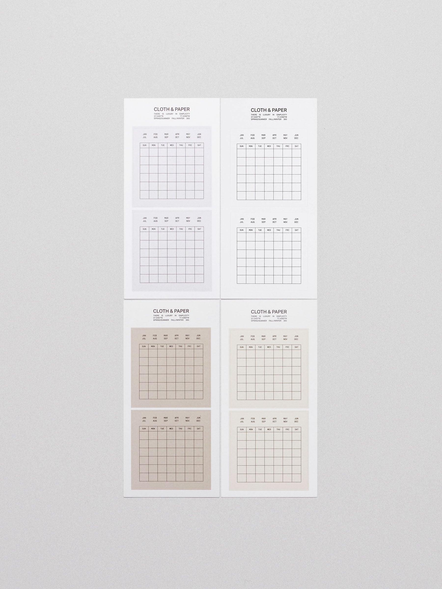 Four sheets of Cloth & Paper Label Planner Stickers titled "Calendar," displayed on a light grey background. Each sheet features minimalist grid calendar stickers in neutral tones, with the months listed at the top and a Sunday-to-Saturday grid layout below for flexible monthly planning.
