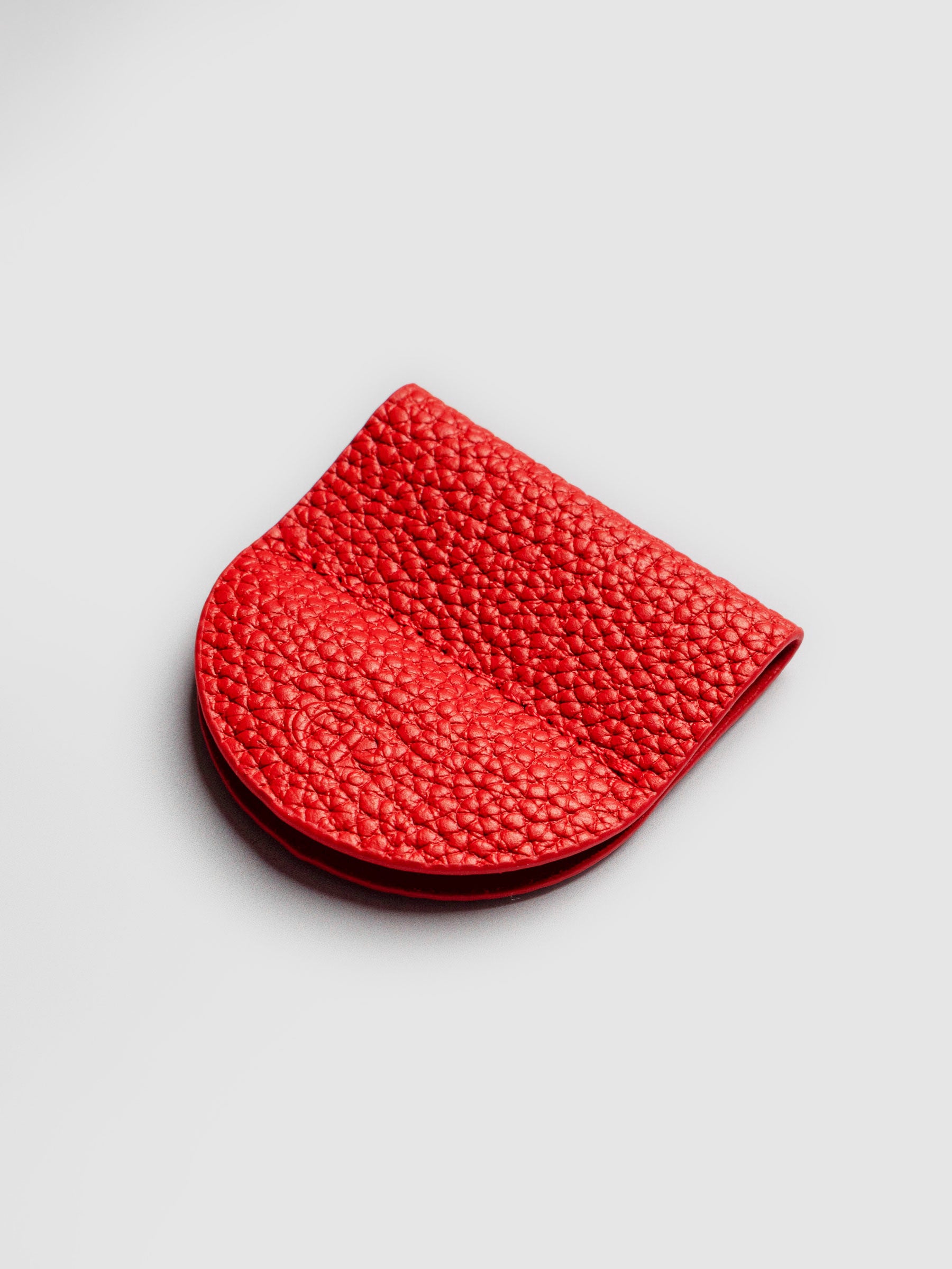 Image shows the eCLIPse Leather Bookmark Pen Holder in Rouge displayed on a neutral background.