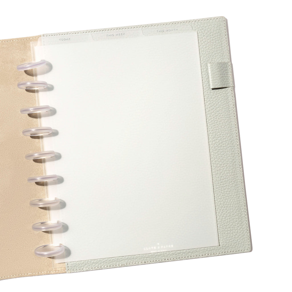 HP Classic White Foil Cadence Tab Dividers displayed in a gray leather planner.