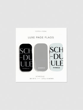 Luxe page flags on their backing on a neutral background. The text on the left and right flag read "Schedule" repeated multiple times.