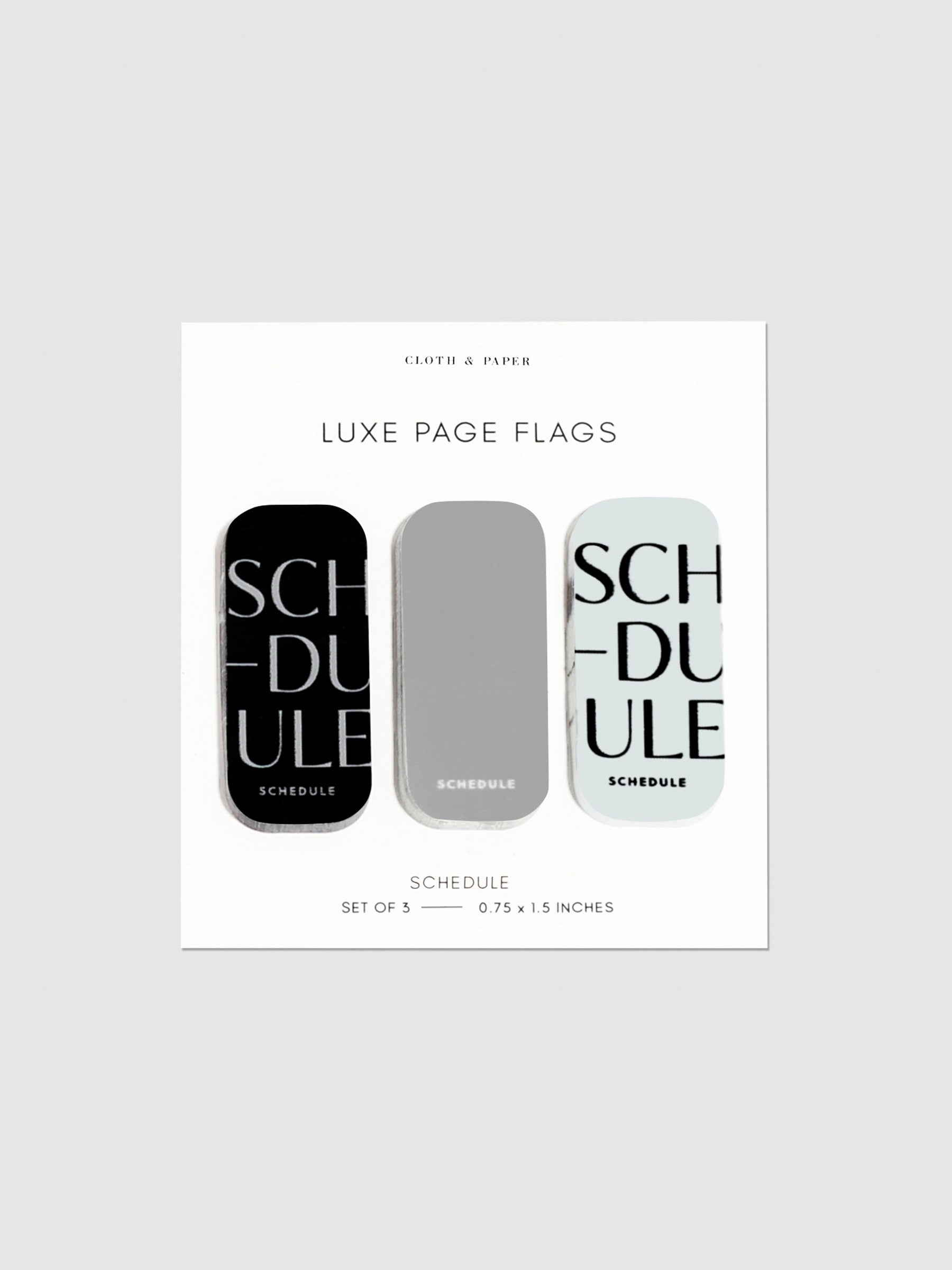 Luxe page flags on their backing on a neutral background. The text on the left and right flag read "Schedule" repeated multiple times.