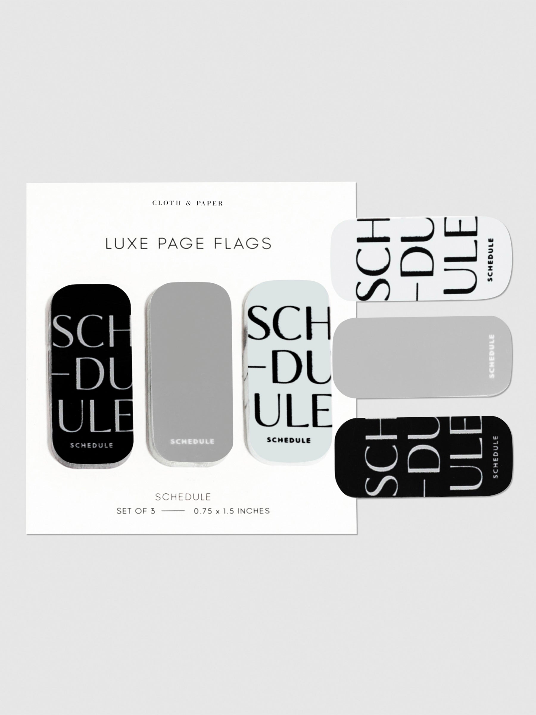 Task page flags on their backings on a neutral background. One of each flag is stuck to the right side of the backing.