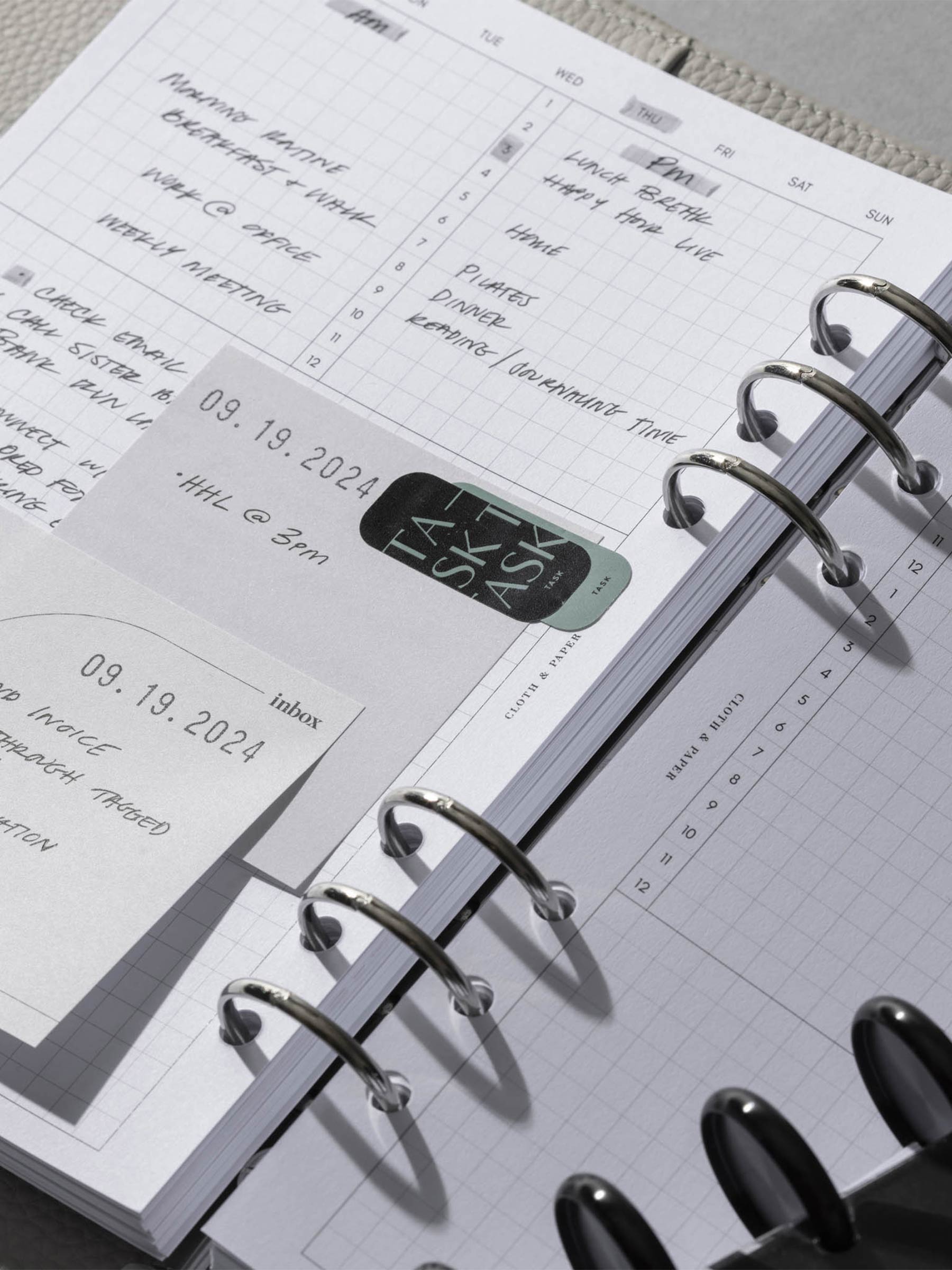 Luxe Page Flag use inside a white leather planner.