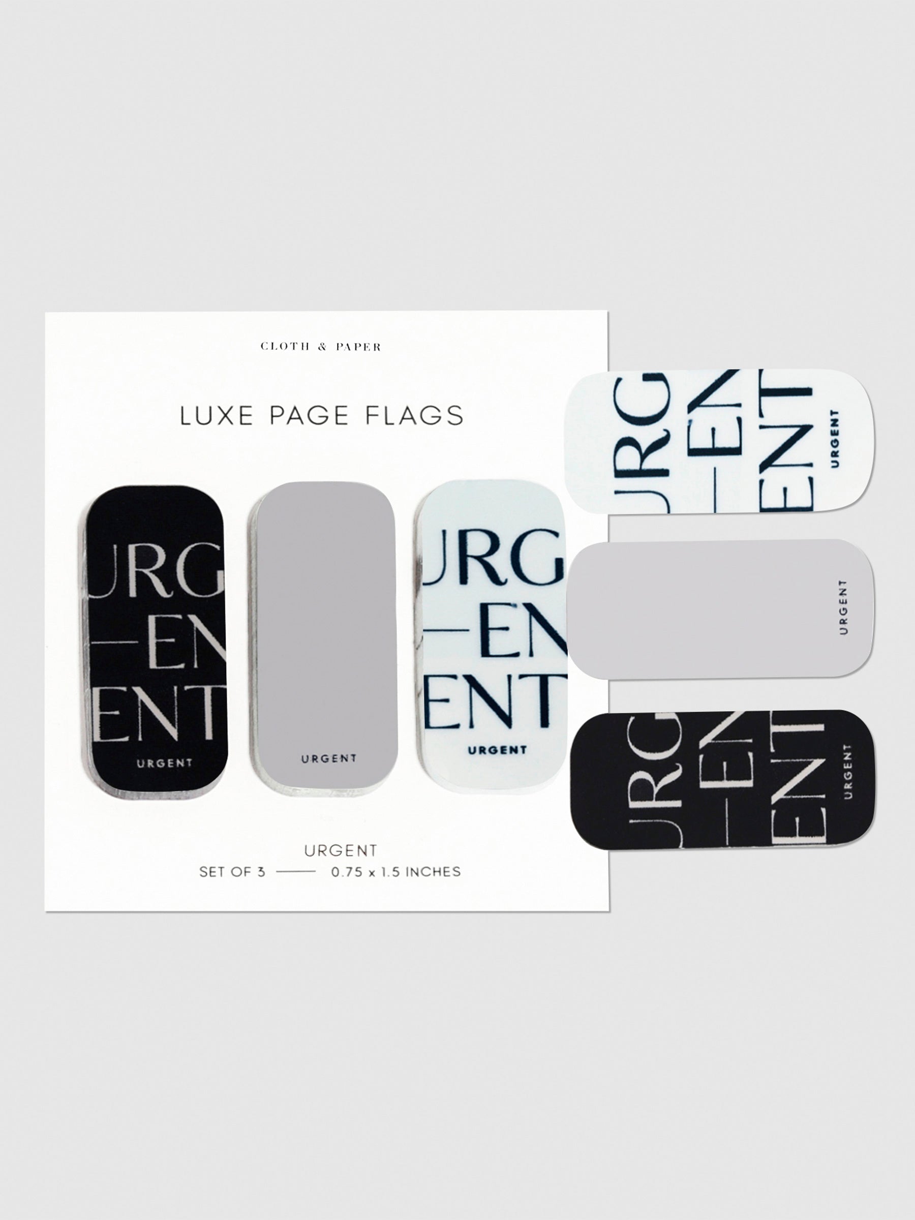 Urgent page flags on their backings on a neutral background. One of each flag is stuck to the right side of the backing.