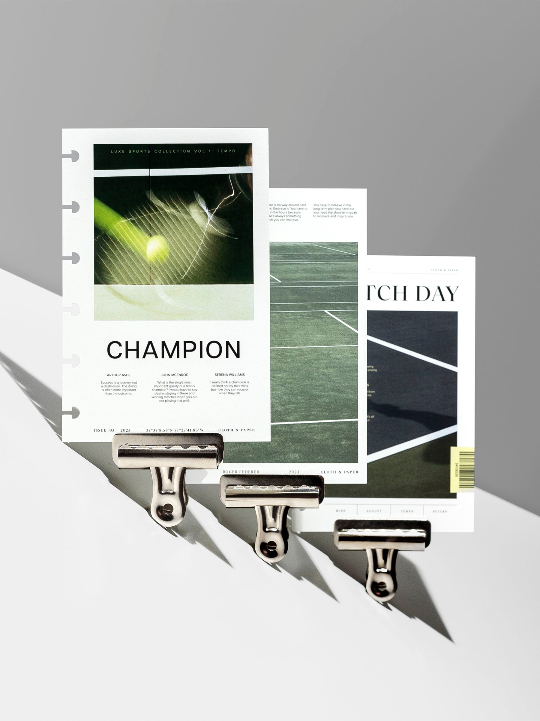 Luxe Sports Planner Dashboard Collection, Volume 1, Cloth and Paper. Set of three dashboards (volume 1-3) displayed with clips on a neutral gray background. 