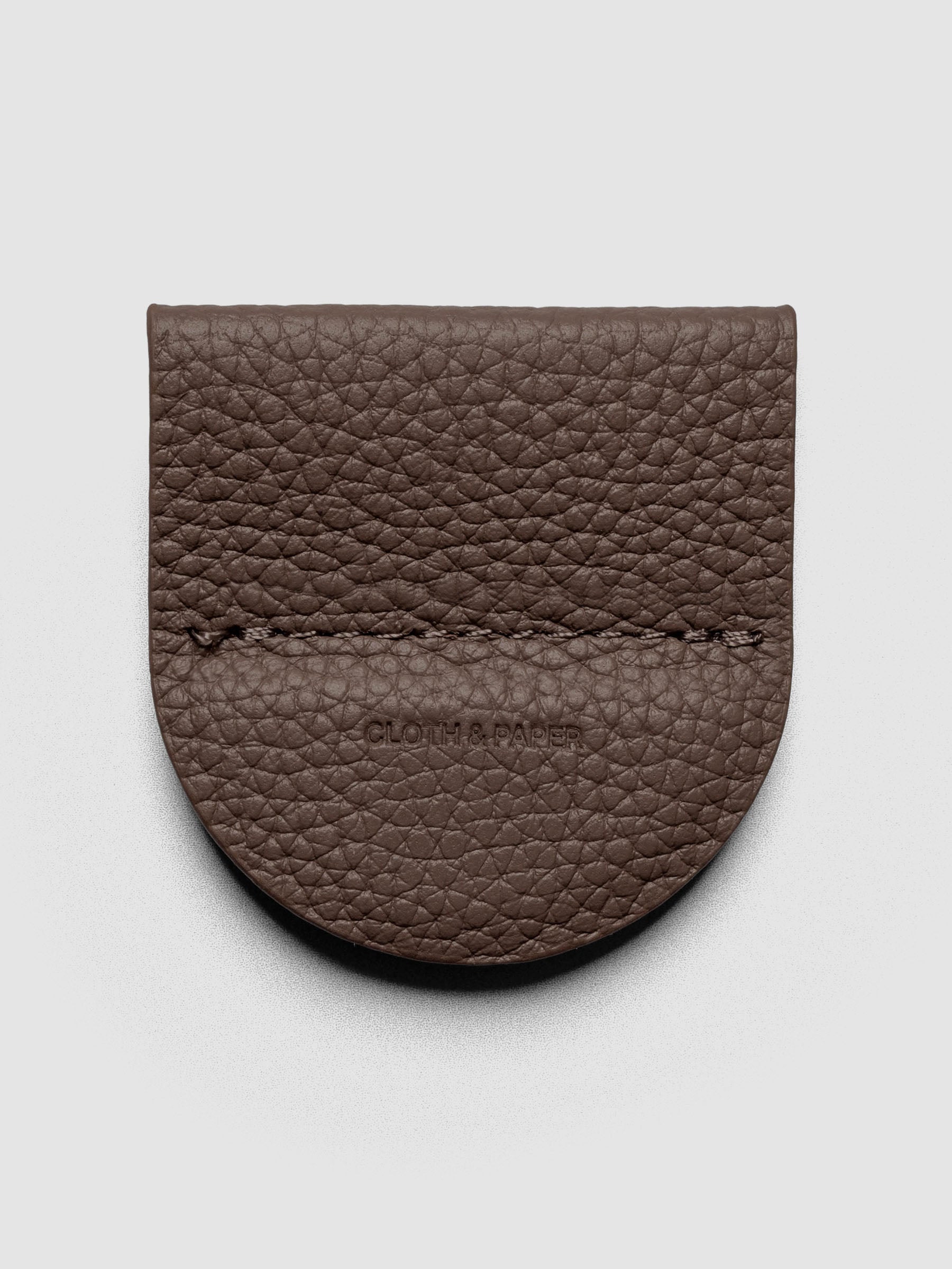 Magnetic Bookmark | Pen Holder in Espresso, a dark brown, displayed on a neutral background.