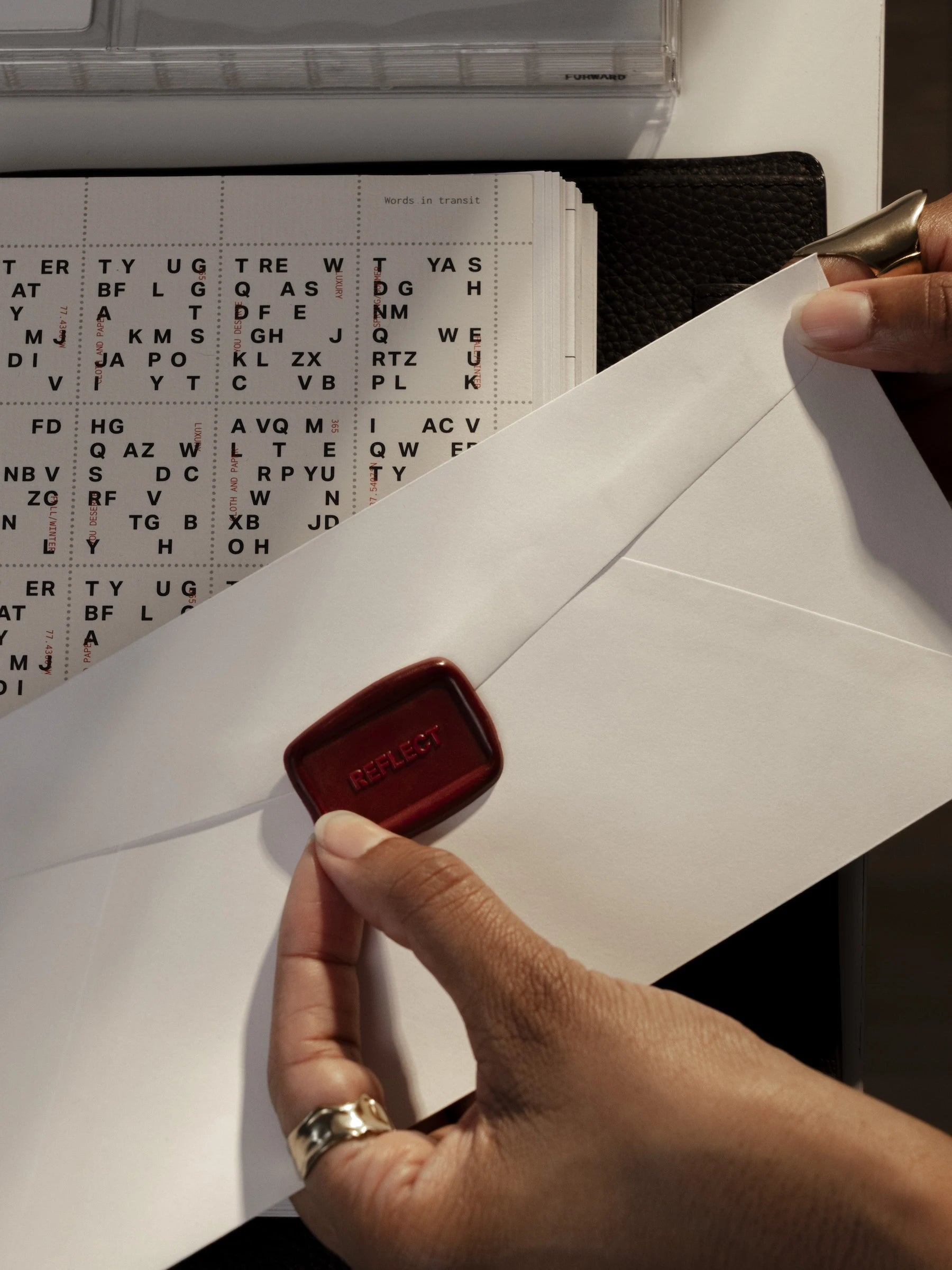 One Label Sticker | Wax Seal being applied to an envelope flap.