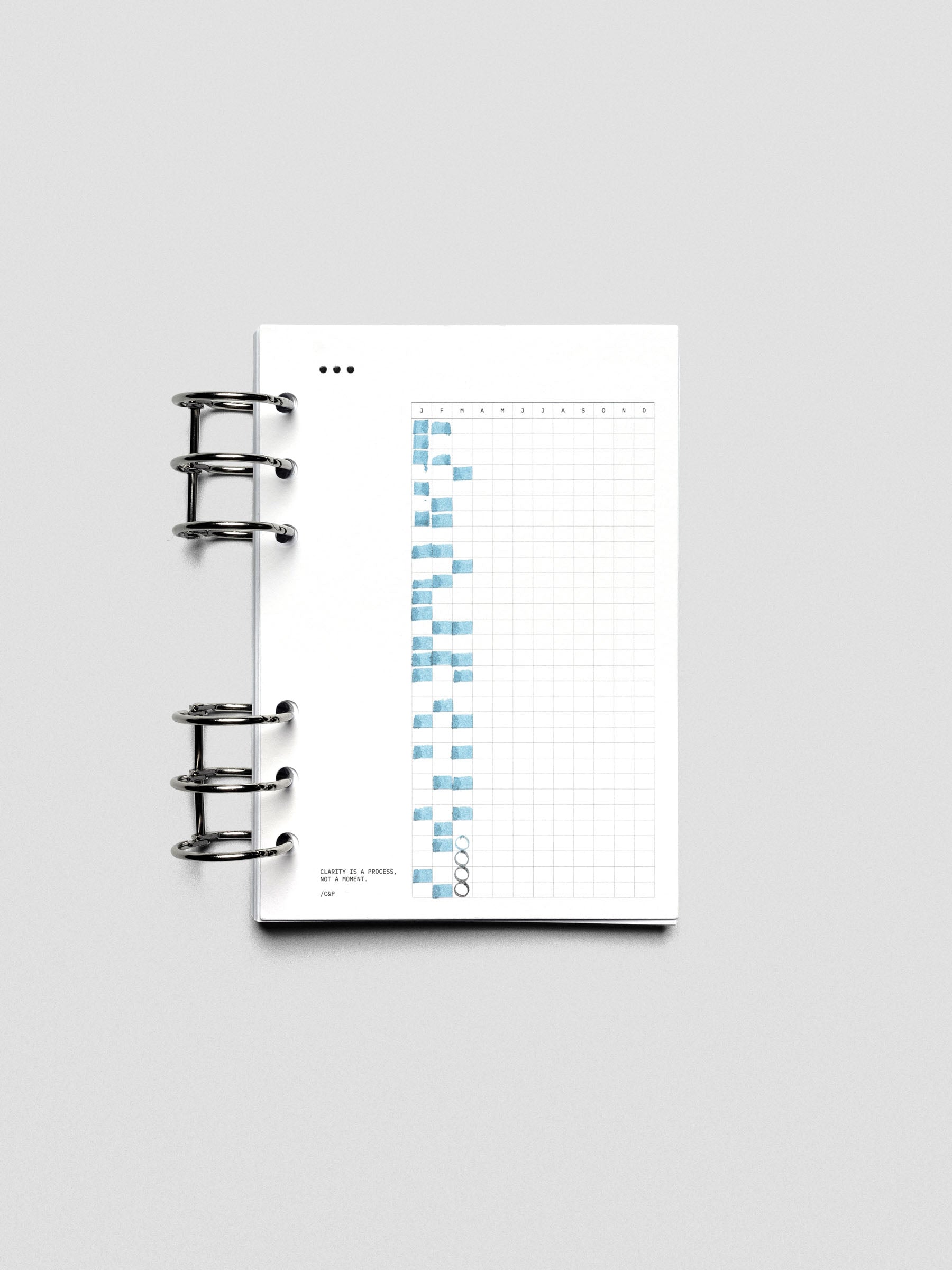 Mindful Moments Planner Dashboard in Personal Wide size shown filled out and ring bound.