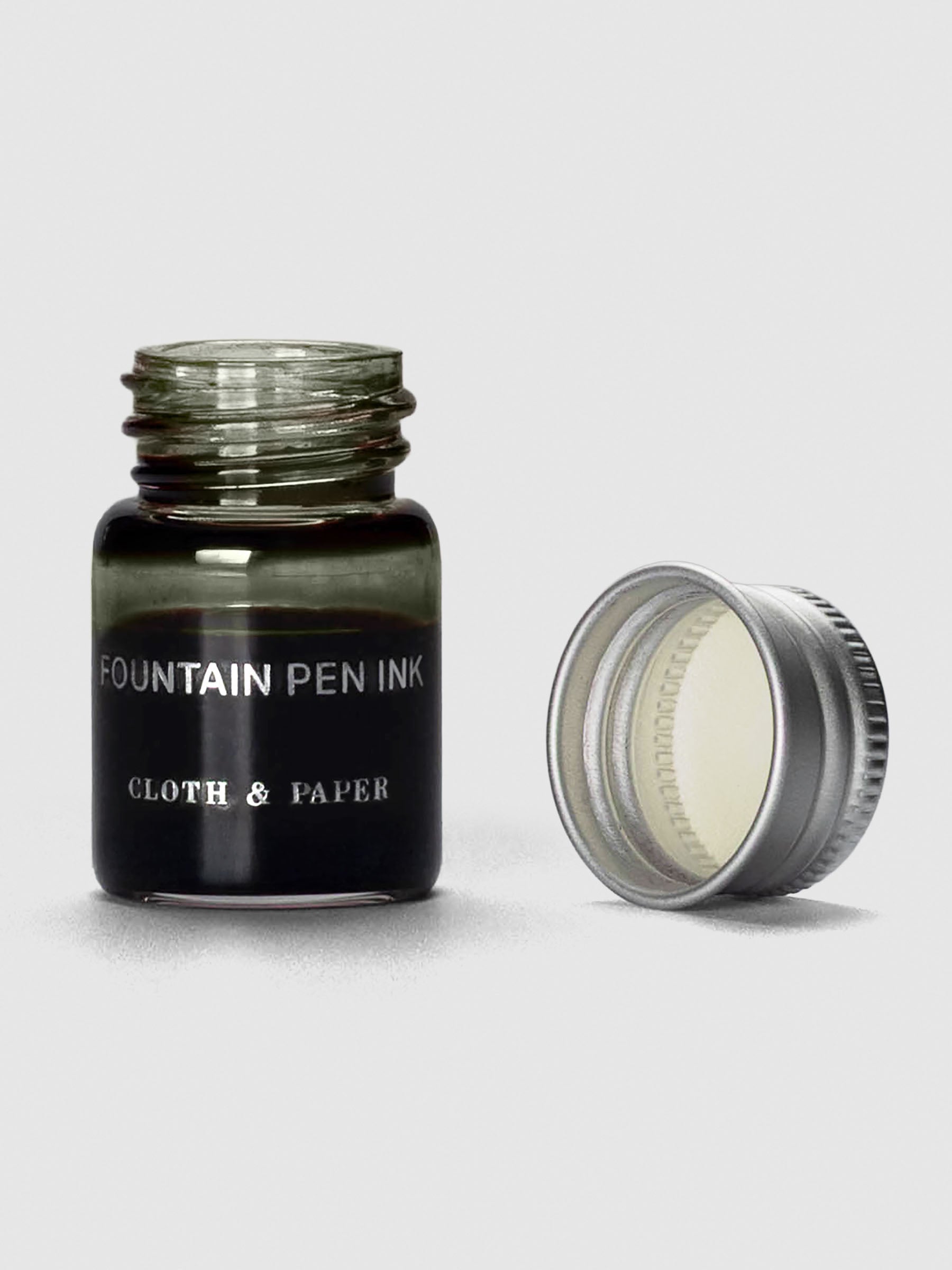 Olive Mini Fountain Pen Ink shown with cap off bottle.