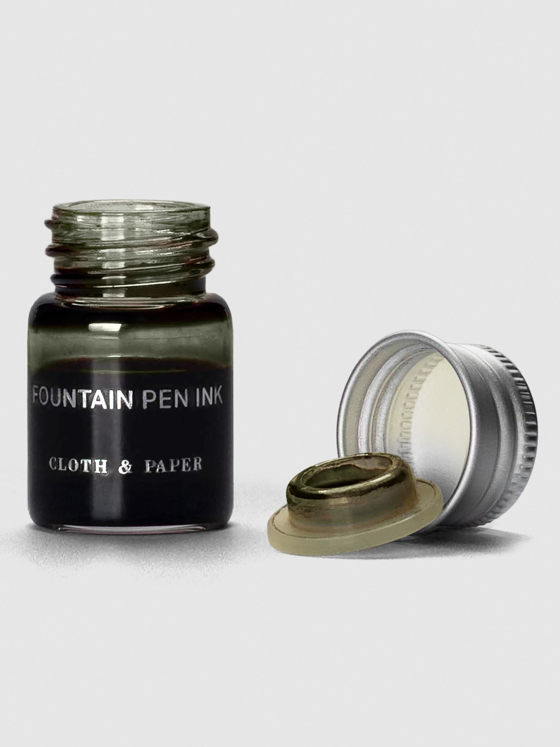 Olive Mini Fountain Pen Ink shown with cap off bottle.