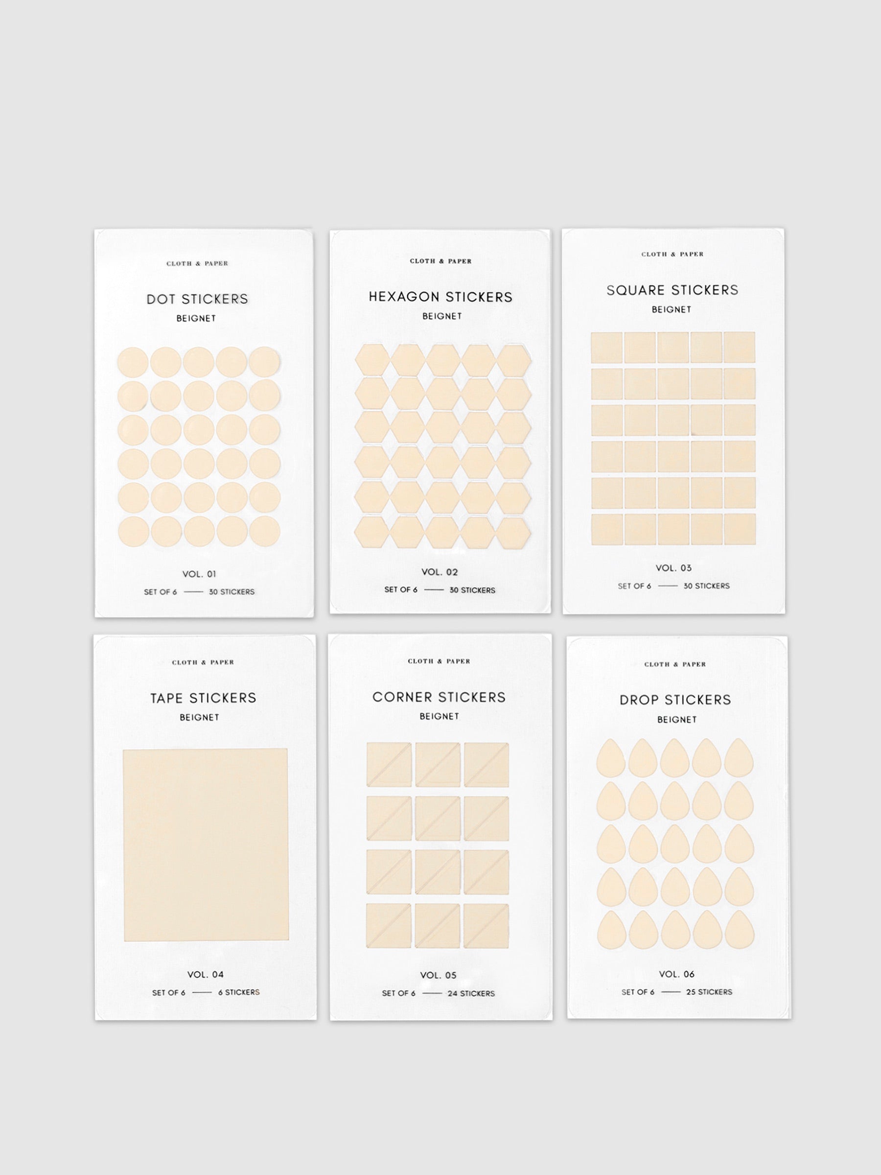 Mini Shape Sticker Set, Transparent, Beignet, Cloth and Paper. 6 different shapes of stickers laid out against a neutral background.