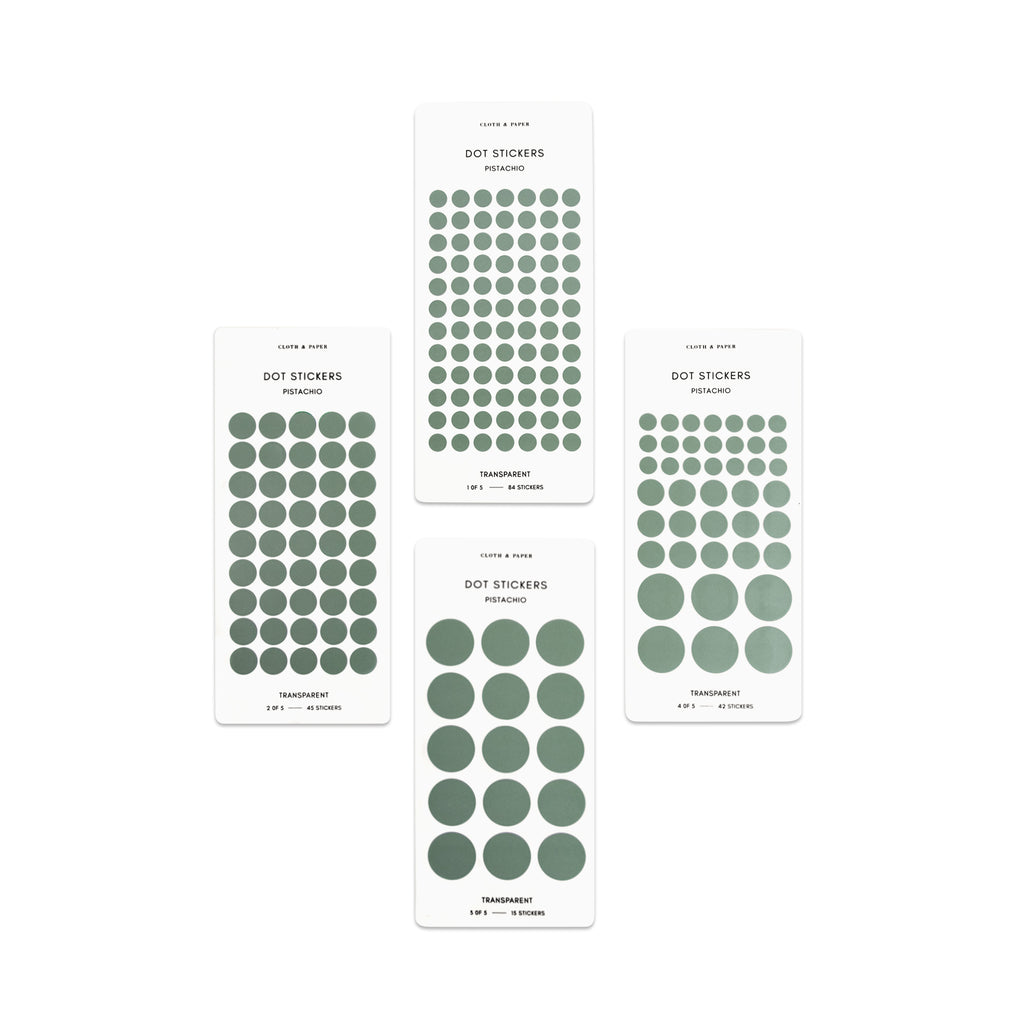 Four sheets of Pistachio dot stickers with varying sizes placed parallel to each other on a white background.