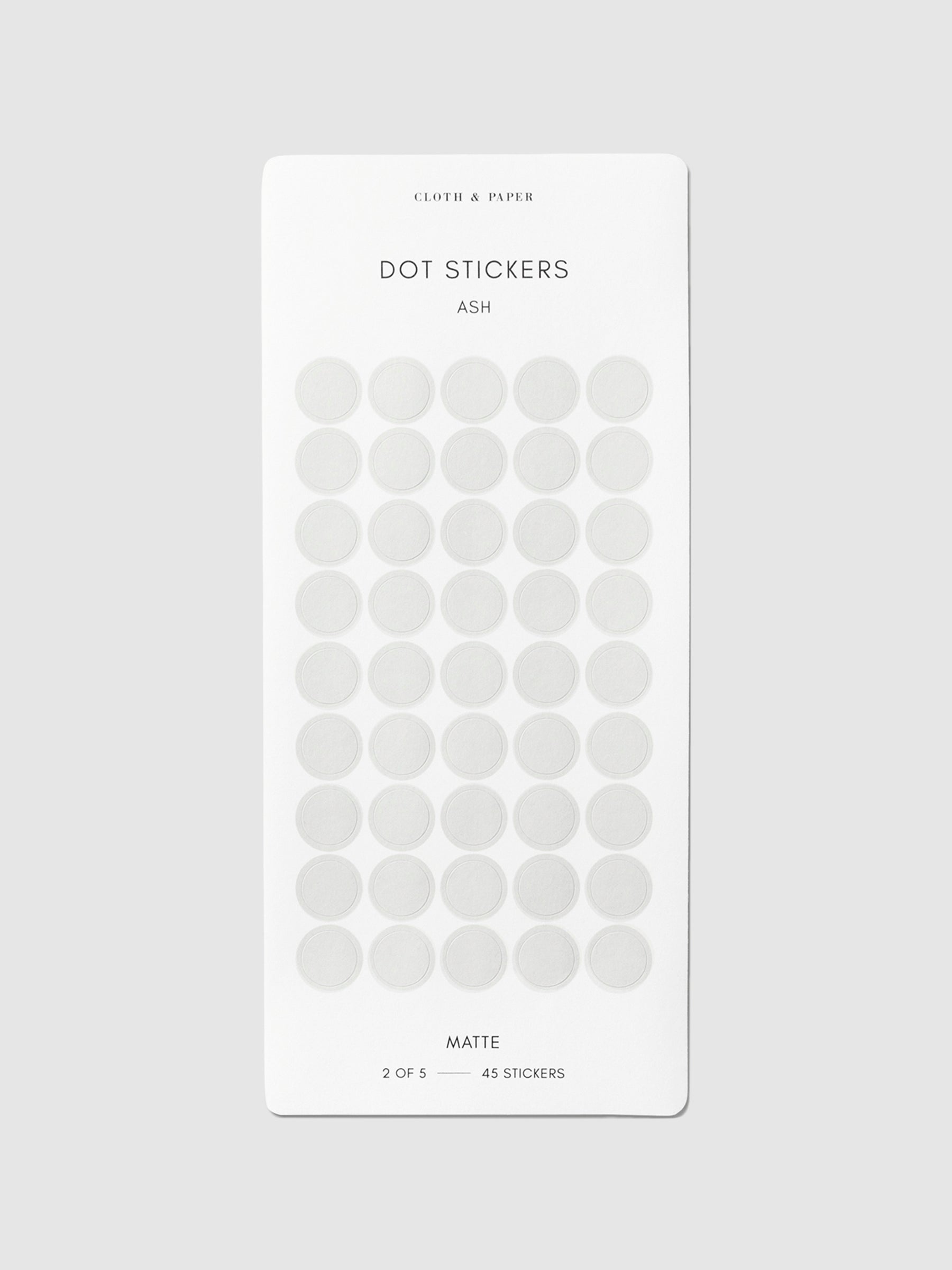 Ash stickers shown in their packaging on a neutral background. Sticker size shown is medium. 