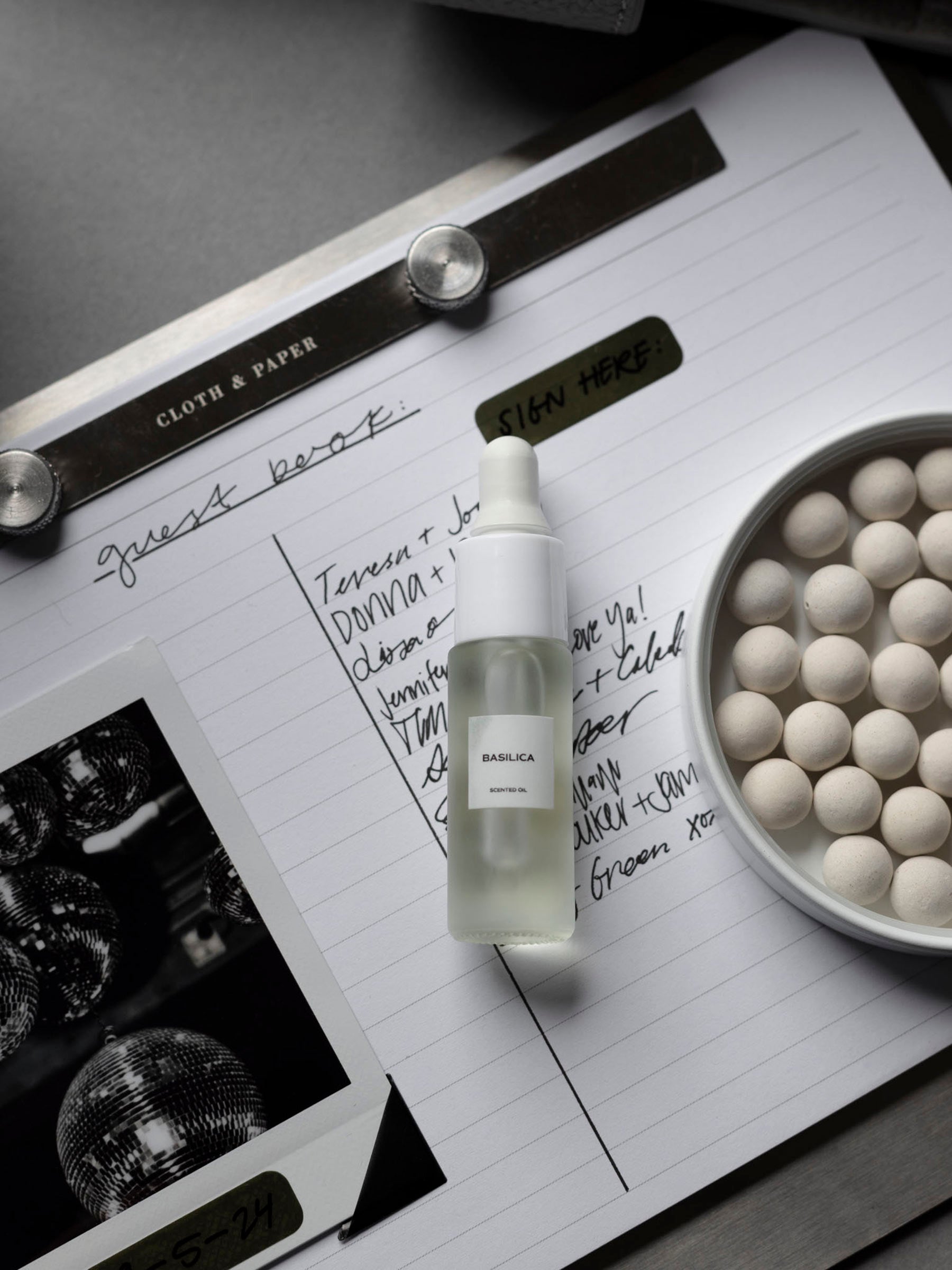 Modern Bound Notepad board, which is stainless steel metal with inserts.