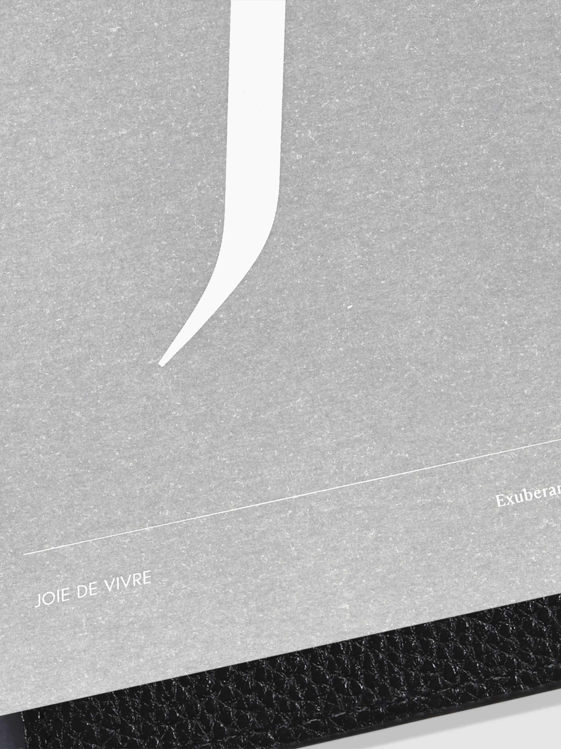 Monogram Vellum Planner Dashboard J in A5 use in a leather planner.