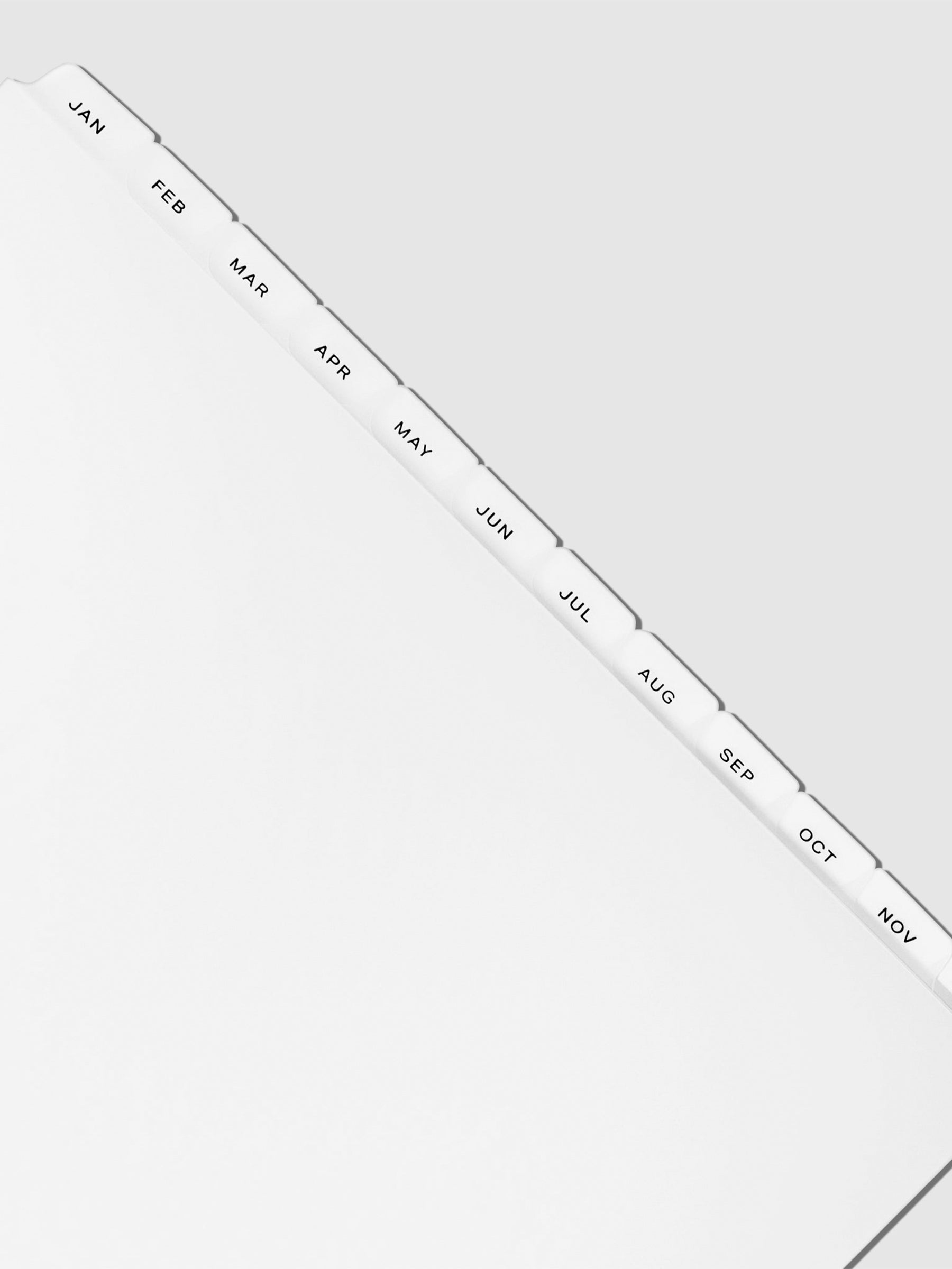 Monthly Side Tab Planner Dividers, Low Profile, Matte. Black foil tabs displayed on a neutral background.