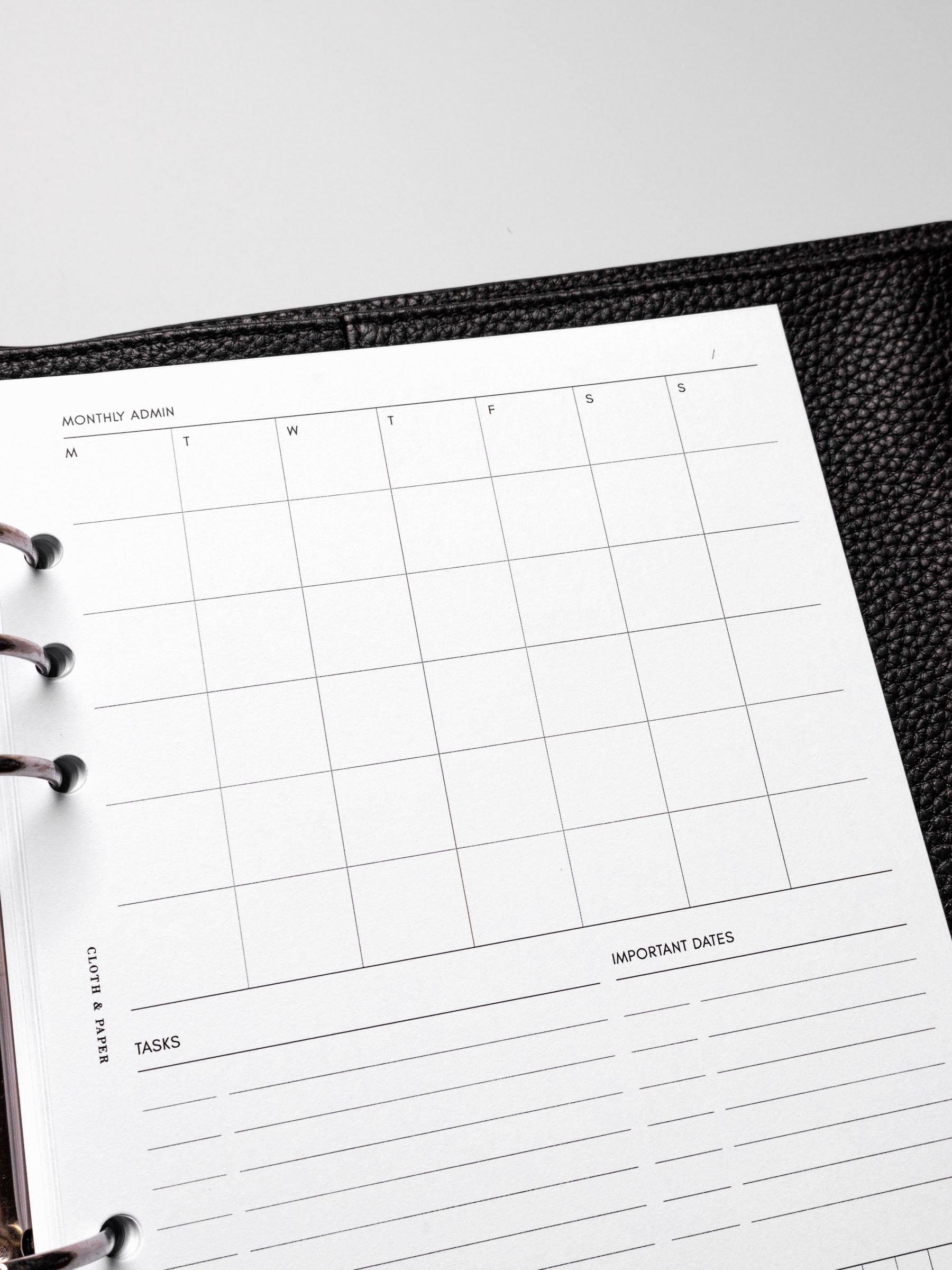 Insert in use inside a black leather planner.
